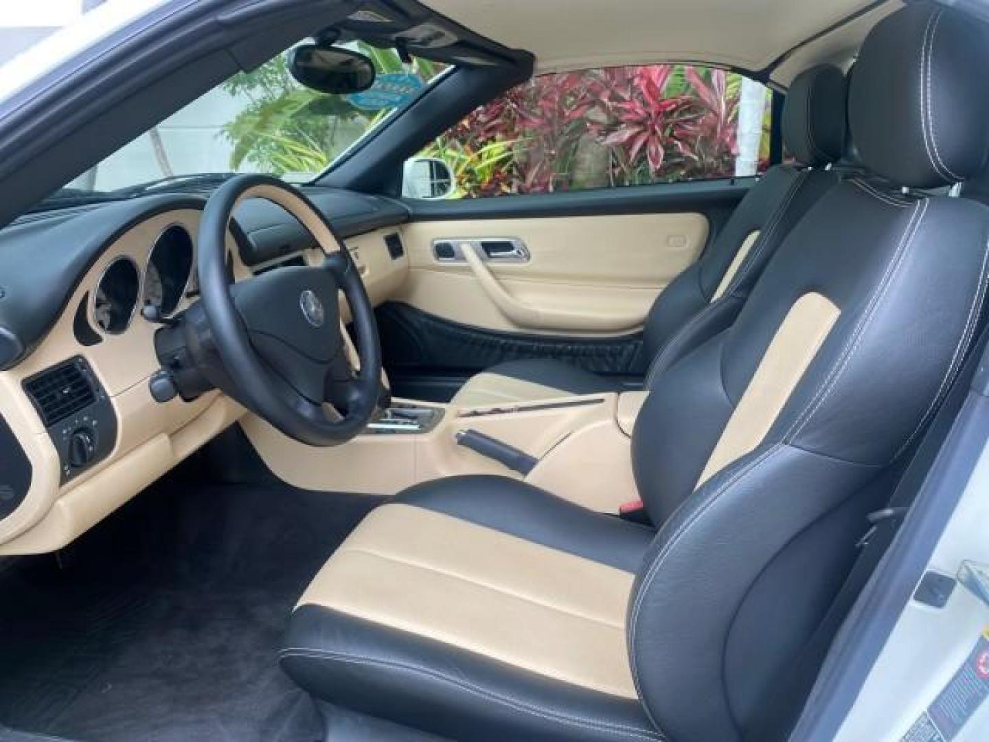 2002 Alabaster White /Charcoal/Beige Mercedes-Benz SLK-Class 2.3L SLK CONV LOW MILES 48,941 (WDBKK49F32F) with an 2.3L Supercharged And Intercooled DOHC SMPI 16-Valve In-Line 4-Cyl Engine engine, Automatic transmission, located at 4701 North Dixie Hwy, Pompano Beach, FL, 33064, (954) 422-2889, 26.240938, -80.123474 - OUR WEBPAGE FLORIDACARS1.COM HAS OVER 100 PHOTOS AND FREE CARFAX LINK 2002 Mercedes-Benz SLK 230 Kompressor Convertible 2.3L I4 F DOHC 16V Gasoline 30 MPG Rear Wheel Drive Features ABS Brakes Air Conditioning Alloy Wheels AM/FM Stereo Automatic Transmission BOSE Sound System Cassette Player Cruise C- Photo#61