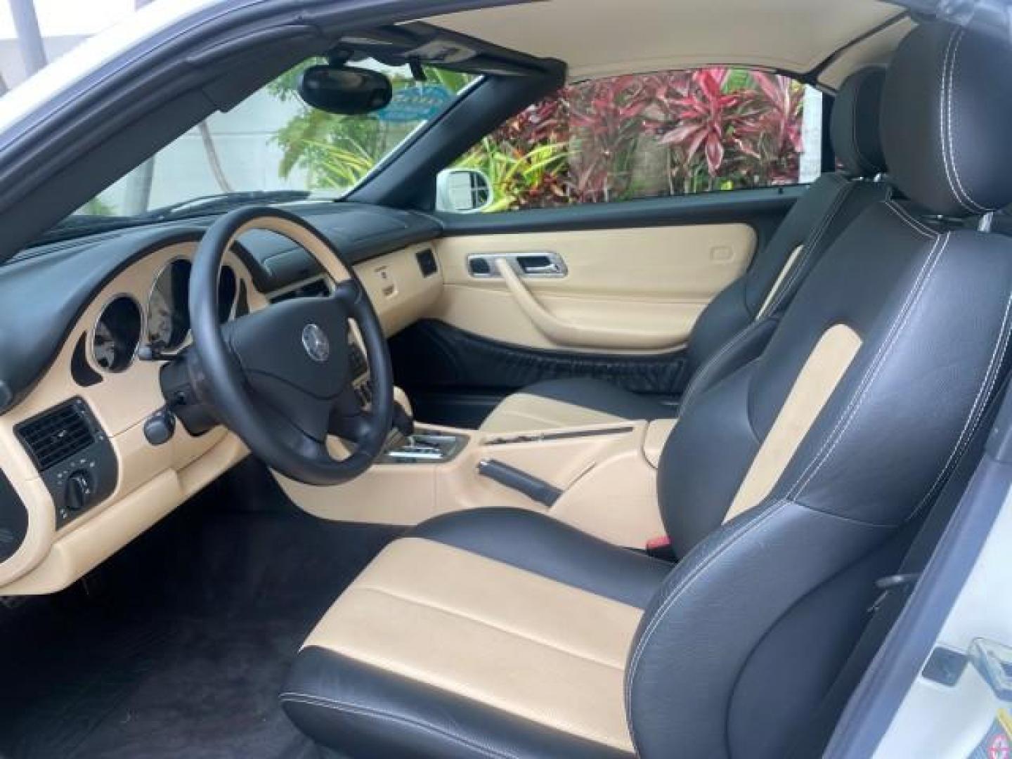 2002 Alabaster White /Charcoal/Beige Mercedes-Benz SLK-Class 2.3L SLK CONV LOW MILES 48,941 (WDBKK49F32F) with an 2.3L Supercharged And Intercooled DOHC SMPI 16-Valve In-Line 4-Cyl Engine engine, Automatic transmission, located at 4701 North Dixie Hwy, Pompano Beach, FL, 33064, (954) 422-2889, 26.240938, -80.123474 - OUR WEBPAGE FLORIDACARS1.COM HAS OVER 100 PHOTOS AND FREE CARFAX LINK 2002 Mercedes-Benz SLK 230 Kompressor Convertible 2.3L I4 F DOHC 16V Gasoline 30 MPG Rear Wheel Drive Features ABS Brakes Air Conditioning Alloy Wheels AM/FM Stereo Automatic Transmission BOSE Sound System Cassette Player Cruise C- Photo#62