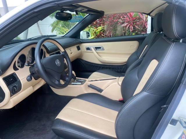 2002 Alabaster White /Charcoal/Beige Mercedes-Benz SLK-Class 2.3L SLK CONV LOW MILES 48,941 (WDBKK49F32F) with an 2.3L Supercharged And Intercooled DOHC SMPI 16-Valve In-Line 4-Cyl Engine engine, Automatic transmission, located at 4701 North Dixie Hwy, Pompano Beach, FL, 33064, (954) 422-2889, 26.240938, -80.123474 - OUR WEBPAGE FLORIDACARS1.COM HAS OVER 100 PHOTOS AND FREE CARFAX LINK 2002 Mercedes-Benz SLK 230 Kompressor Convertible 2.3L I4 F DOHC 16V Gasoline 30 MPG Rear Wheel Drive Features ABS Brakes Air Conditioning Alloy Wheels AM/FM Stereo Automatic Transmission BOSE Sound System Cassette Player Cruise C - Photo#62