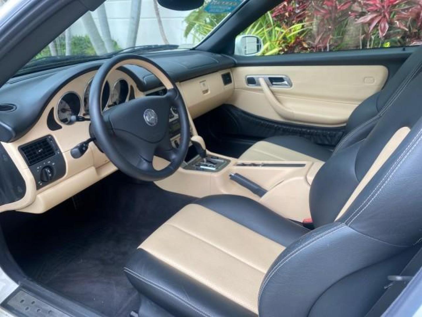2002 Alabaster White /Charcoal/Beige Mercedes-Benz SLK-Class 2.3L SLK CONV LOW MILES 48,941 (WDBKK49F32F) with an 2.3L Supercharged And Intercooled DOHC SMPI 16-Valve In-Line 4-Cyl Engine engine, Automatic transmission, located at 4701 North Dixie Hwy, Pompano Beach, FL, 33064, (954) 422-2889, 26.240938, -80.123474 - OUR WEBPAGE FLORIDACARS1.COM HAS OVER 100 PHOTOS AND FREE CARFAX LINK 2002 Mercedes-Benz SLK 230 Kompressor Convertible 2.3L I4 F DOHC 16V Gasoline 30 MPG Rear Wheel Drive Features ABS Brakes Air Conditioning Alloy Wheels AM/FM Stereo Automatic Transmission BOSE Sound System Cassette Player Cruise C- Photo#64