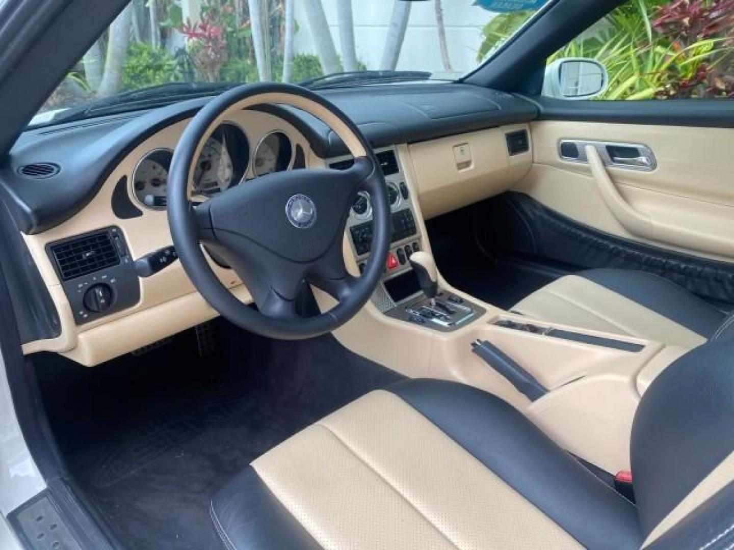 2002 Alabaster White /Charcoal/Beige Mercedes-Benz SLK-Class 2.3L SLK CONV LOW MILES 48,941 (WDBKK49F32F) with an 2.3L Supercharged And Intercooled DOHC SMPI 16-Valve In-Line 4-Cyl Engine engine, Automatic transmission, located at 4701 North Dixie Hwy, Pompano Beach, FL, 33064, (954) 422-2889, 26.240938, -80.123474 - OUR WEBPAGE FLORIDACARS1.COM HAS OVER 100 PHOTOS AND FREE CARFAX LINK 2002 Mercedes-Benz SLK 230 Kompressor Convertible 2.3L I4 F DOHC 16V Gasoline 30 MPG Rear Wheel Drive Features ABS Brakes Air Conditioning Alloy Wheels AM/FM Stereo Automatic Transmission BOSE Sound System Cassette Player Cruise C- Photo#66
