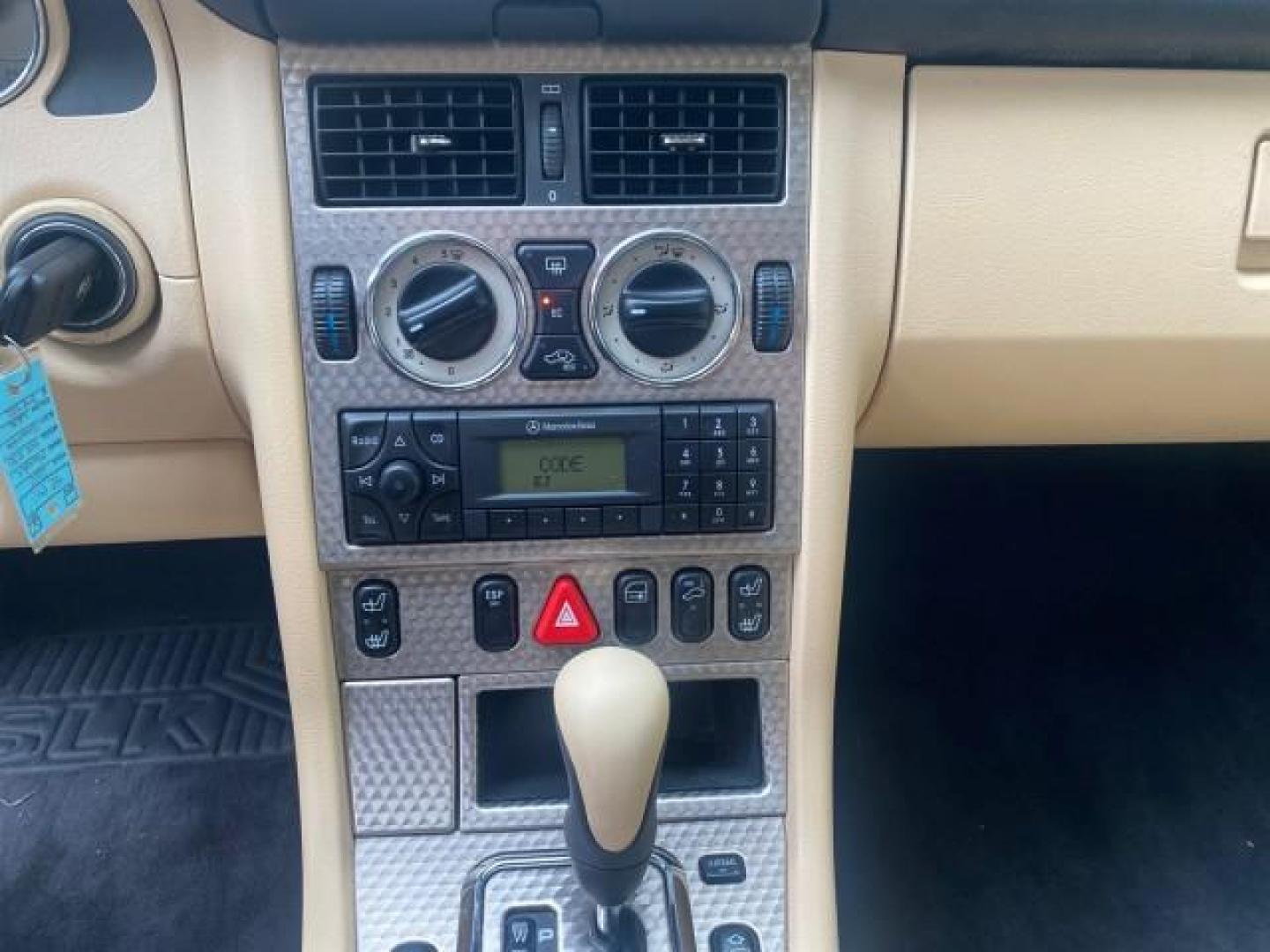 2002 Alabaster White /Charcoal/Beige Mercedes-Benz SLK-Class 2.3L SLK CONV LOW MILES 48,941 (WDBKK49F32F) with an 2.3L Supercharged And Intercooled DOHC SMPI 16-Valve In-Line 4-Cyl Engine engine, Automatic transmission, located at 4701 North Dixie Hwy, Pompano Beach, FL, 33064, (954) 422-2889, 26.240938, -80.123474 - OUR WEBPAGE FLORIDACARS1.COM HAS OVER 100 PHOTOS AND FREE CARFAX LINK 2002 Mercedes-Benz SLK 230 Kompressor Convertible 2.3L I4 F DOHC 16V Gasoline 30 MPG Rear Wheel Drive Features ABS Brakes Air Conditioning Alloy Wheels AM/FM Stereo Automatic Transmission BOSE Sound System Cassette Player Cruise C- Photo#72