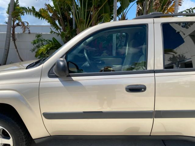 2005 Sandstone Metallic /Light Cashmere/Ebony Chevrolet TrailBlazer 4WD LS 1 OWNER LOW MILES 75,632 (1GNDT13S452) with an 4.2L Vortec 4200 SFI I6 Engine engine, Automatic transmission, located at 4701 North Dixie Hwy, Pompano Beach, FL, 33064, (954) 422-2889, 26.240938, -80.123474 - OUR WEBPAGE FLORIDACARS1.COM HAS OVER 100 PHOTOS AND FREE CARFAX LINK 2005 Chevrolet Trailblazer LS 1 OWNER 4 Door Wagon/Sport Utility 4.2L I6 F Gasoline 20 MPG Wheel Drive w/ 4X4 Features 4WD/AWD ABS Brakes Air Conditioning Alloy Wheels AM/FM Stereo Automatic Transmission CD Audio Cloth Seats Conve - Photo#37