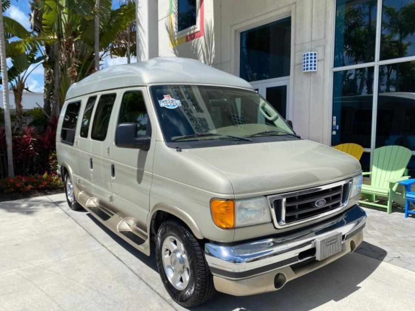 2004 Gold Ash Metallic /Medium Pebble Ford Econoline HIGH TOP CONVERSION VAN 1 OWNER LOW MILES 37,883 (1FDRE14L64H) with an 5.4L SOHC EFI V8 Triton Engine engine, Automatic transmission, located at 4701 North Dixie Hwy, Pompano Beach, FL, 33064, (954) 422-2889, 26.240938, -80.123474 - OUR WEBPAGE FLORIDACARS1.COM HAS OVER 100 PHOTOS AND FREE CARFAX LINK 2004 Ford Econoline E150 HIGH TOP CONVERSION VAN SHERROD 1 OWNER Van 5.4L V8 F SOHC 16V Gasoline 17 MPG Rear Wheel Drive Features ABS Brakes Air Conditioning Alloy Wheels AM/FM Stereo Automatic Transmission CD Audio Conversion Van- Photo#1