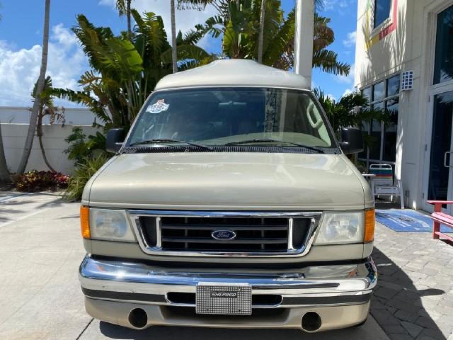 2004 Gold Ash Metallic /Medium Pebble Ford Econoline HIGH TOP CONVERSION VAN 1 OWNER LOW MILES 37,883 (1FDRE14L64H) with an 5.4L SOHC EFI V8 Triton Engine engine, Automatic transmission, located at 4701 North Dixie Hwy, Pompano Beach, FL, 33064, (954) 422-2889, 26.240938, -80.123474 - OUR WEBPAGE FLORIDACARS1.COM HAS OVER 100 PHOTOS AND FREE CARFAX LINK 2004 Ford Econoline E150 HIGH TOP CONVERSION VAN SHERROD 1 OWNER Van 5.4L V8 F SOHC 16V Gasoline 17 MPG Rear Wheel Drive Features ABS Brakes Air Conditioning Alloy Wheels AM/FM Stereo Automatic Transmission CD Audio Conversion Van- Photo#2
