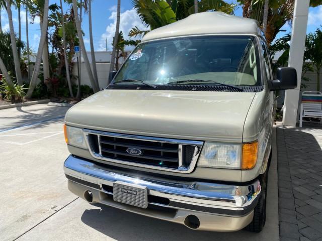 2004 Gold Ash Metallic /Medium Pebble Ford Econoline HIGH TOP CONVERSION VAN 1 OWNER LOW MILES 37,883 (1FDRE14L64H) with an 5.4L SOHC EFI V8 Triton Engine engine, Automatic transmission, located at 4701 North Dixie Hwy, Pompano Beach, FL, 33064, (954) 422-2889, 26.240938, -80.123474 - OUR WEBPAGE FLORIDACARS1.COM HAS OVER 100 PHOTOS AND FREE CARFAX LINK 2004 Ford Econoline E150 HIGH TOP CONVERSION VAN SHERROD 1 OWNER Van 5.4L V8 F SOHC 16V Gasoline 17 MPG Rear Wheel Drive Features ABS Brakes Air Conditioning Alloy Wheels AM/FM Stereo Automatic Transmission CD Audio Conversion Van - Photo#3