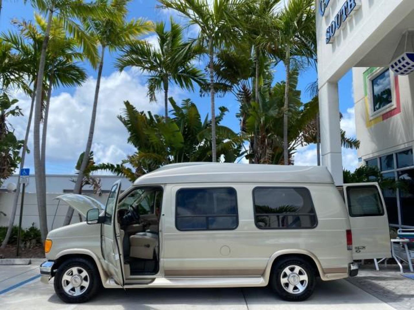 2004 Gold Ash Metallic /Medium Pebble Ford Econoline HIGH TOP CONVERSION VAN 1 OWNER LOW MILES 37,883 (1FDRE14L64H) with an 5.4L SOHC EFI V8 Triton Engine engine, Automatic transmission, located at 4701 North Dixie Hwy, Pompano Beach, FL, 33064, (954) 422-2889, 26.240938, -80.123474 - OUR WEBPAGE FLORIDACARS1.COM HAS OVER 100 PHOTOS AND FREE CARFAX LINK 2004 Ford Econoline E150 HIGH TOP CONVERSION VAN SHERROD 1 OWNER Van 5.4L V8 F SOHC 16V Gasoline 17 MPG Rear Wheel Drive Features ABS Brakes Air Conditioning Alloy Wheels AM/FM Stereo Automatic Transmission CD Audio Conversion Van- Photo#8