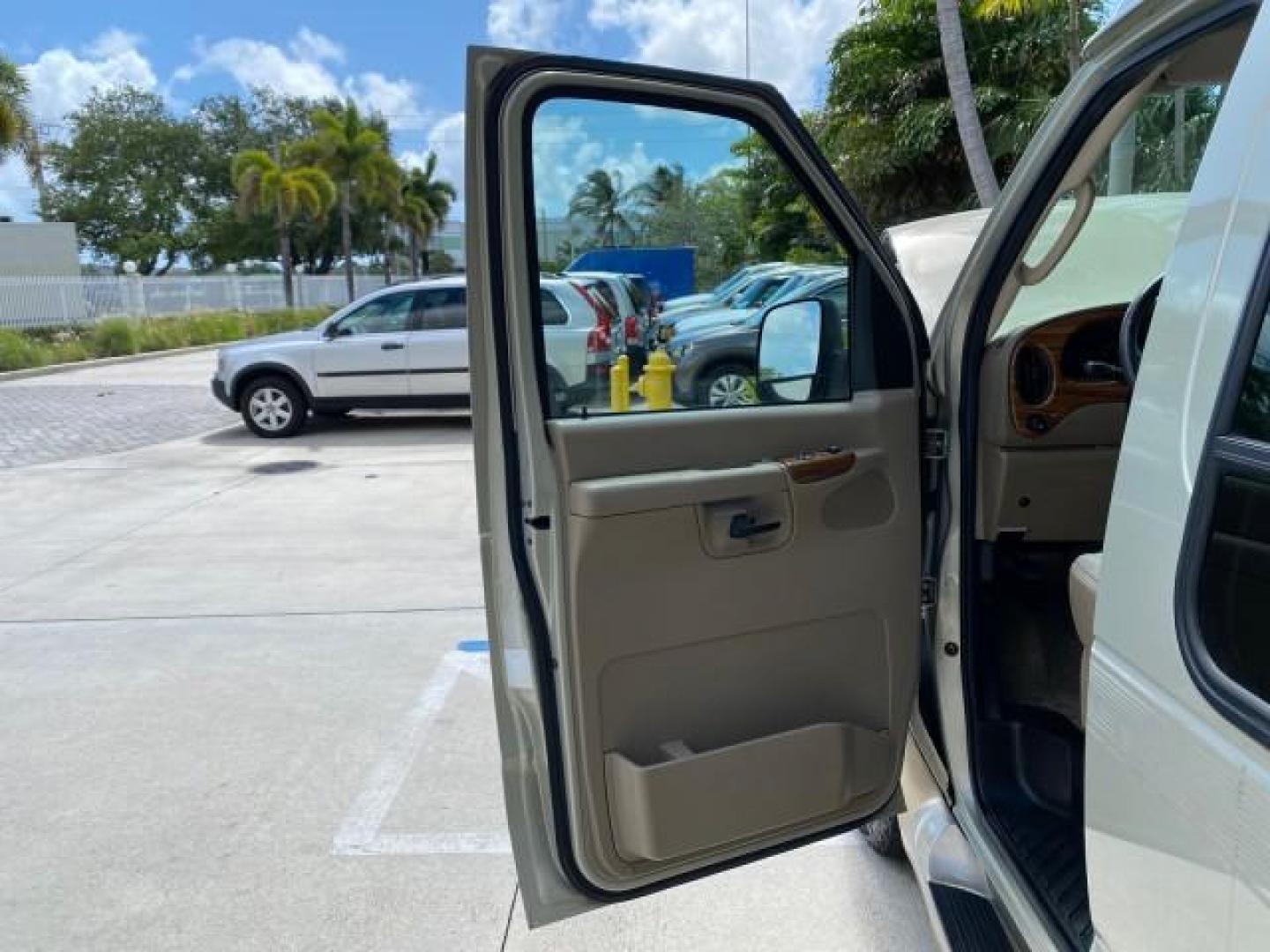 2004 Gold Ash Metallic /Medium Pebble Ford Econoline HIGH TOP CONVERSION VAN 1 OWNER LOW MILES 37,883 (1FDRE14L64H) with an 5.4L SOHC EFI V8 Triton Engine engine, Automatic transmission, located at 4701 North Dixie Hwy, Pompano Beach, FL, 33064, (954) 422-2889, 26.240938, -80.123474 - OUR WEBPAGE FLORIDACARS1.COM HAS OVER 100 PHOTOS AND FREE CARFAX LINK 2004 Ford Econoline E150 HIGH TOP CONVERSION VAN SHERROD 1 OWNER Van 5.4L V8 F SOHC 16V Gasoline 17 MPG Rear Wheel Drive Features ABS Brakes Air Conditioning Alloy Wheels AM/FM Stereo Automatic Transmission CD Audio Conversion Van- Photo#9