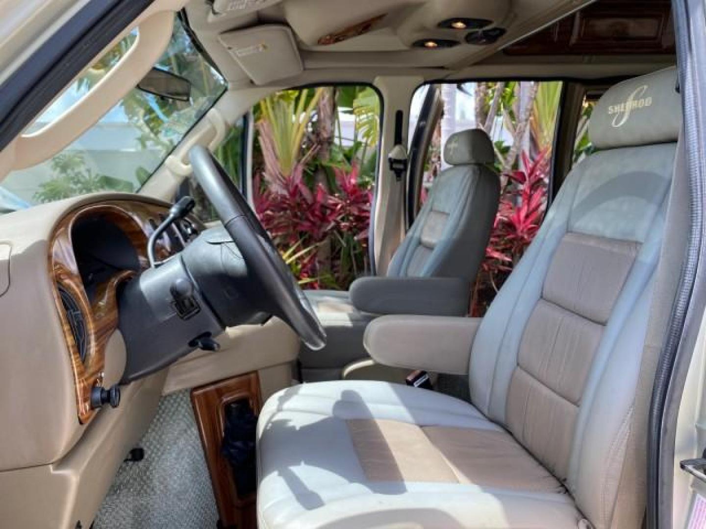 2004 Gold Ash Metallic /Medium Pebble Ford Econoline HIGH TOP CONVERSION VAN 1 OWNER LOW MILES 37,883 (1FDRE14L64H) with an 5.4L SOHC EFI V8 Triton Engine engine, Automatic transmission, located at 4701 North Dixie Hwy, Pompano Beach, FL, 33064, (954) 422-2889, 26.240938, -80.123474 - OUR WEBPAGE FLORIDACARS1.COM HAS OVER 100 PHOTOS AND FREE CARFAX LINK 2004 Ford Econoline E150 HIGH TOP CONVERSION VAN SHERROD 1 OWNER Van 5.4L V8 F SOHC 16V Gasoline 17 MPG Rear Wheel Drive Features ABS Brakes Air Conditioning Alloy Wheels AM/FM Stereo Automatic Transmission CD Audio Conversion Van- Photo#10