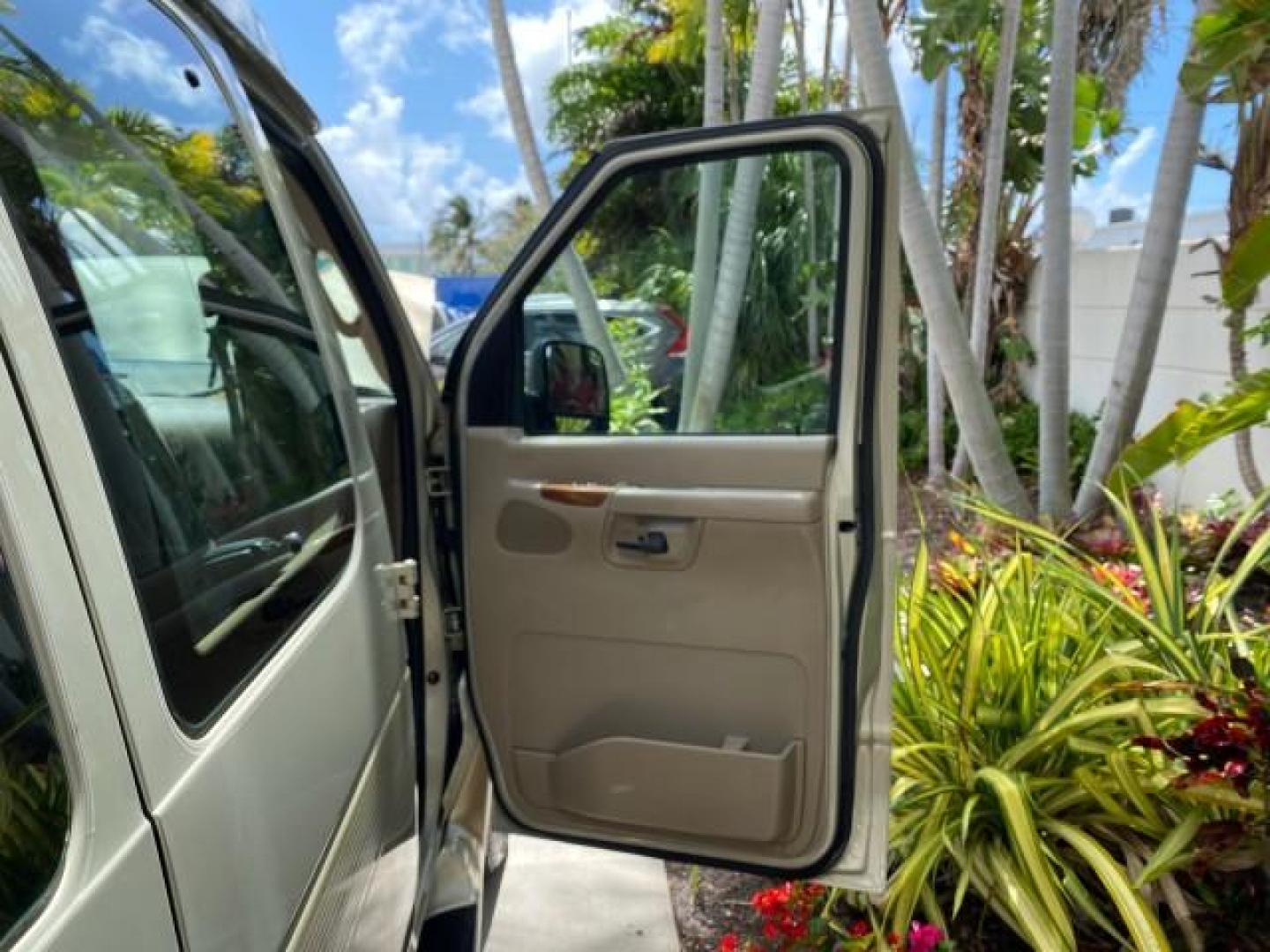 2004 Gold Ash Metallic /Medium Pebble Ford Econoline HIGH TOP CONVERSION VAN 1 OWNER LOW MILES 37,883 (1FDRE14L64H) with an 5.4L SOHC EFI V8 Triton Engine engine, Automatic transmission, located at 4701 North Dixie Hwy, Pompano Beach, FL, 33064, (954) 422-2889, 26.240938, -80.123474 - OUR WEBPAGE FLORIDACARS1.COM HAS OVER 100 PHOTOS AND FREE CARFAX LINK 2004 Ford Econoline E150 HIGH TOP CONVERSION VAN SHERROD 1 OWNER Van 5.4L V8 F SOHC 16V Gasoline 17 MPG Rear Wheel Drive Features ABS Brakes Air Conditioning Alloy Wheels AM/FM Stereo Automatic Transmission CD Audio Conversion Van- Photo#11