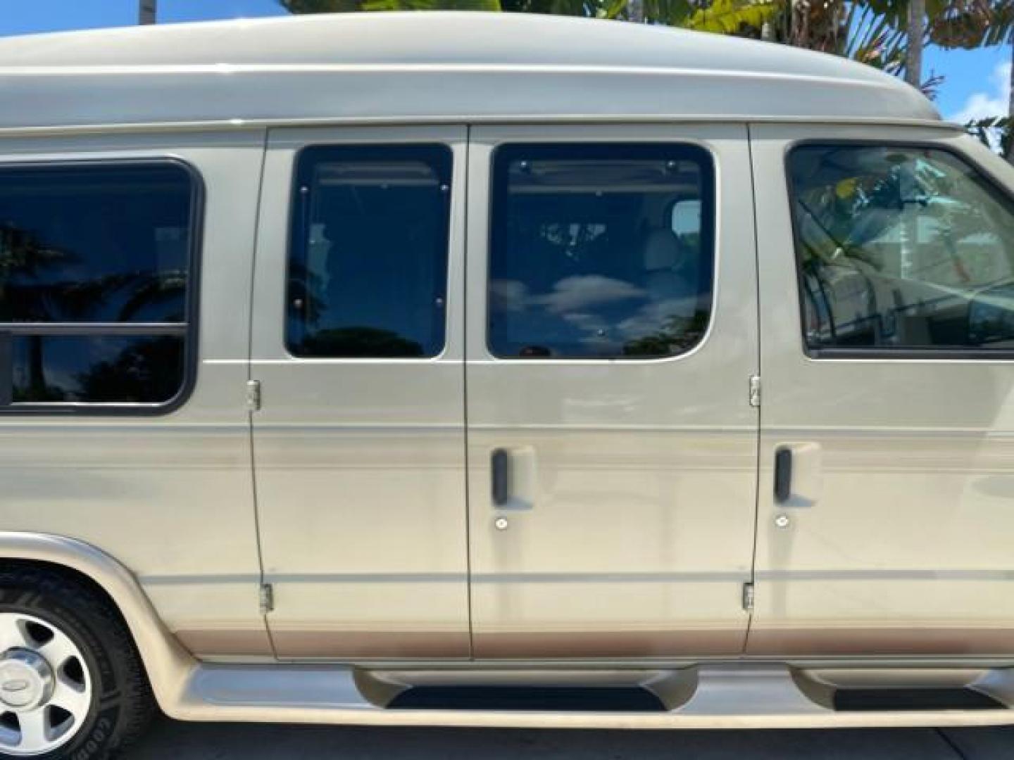 2004 Gold Ash Metallic /Medium Pebble Ford Econoline HIGH TOP CONVERSION VAN 1 OWNER LOW MILES 37,883 (1FDRE14L64H) with an 5.4L SOHC EFI V8 Triton Engine engine, Automatic transmission, located at 4701 North Dixie Hwy, Pompano Beach, FL, 33064, (954) 422-2889, 26.240938, -80.123474 - OUR WEBPAGE FLORIDACARS1.COM HAS OVER 100 PHOTOS AND FREE CARFAX LINK 2004 Ford Econoline E150 HIGH TOP CONVERSION VAN SHERROD 1 OWNER Van 5.4L V8 F SOHC 16V Gasoline 17 MPG Rear Wheel Drive Features ABS Brakes Air Conditioning Alloy Wheels AM/FM Stereo Automatic Transmission CD Audio Conversion Van- Photo#13