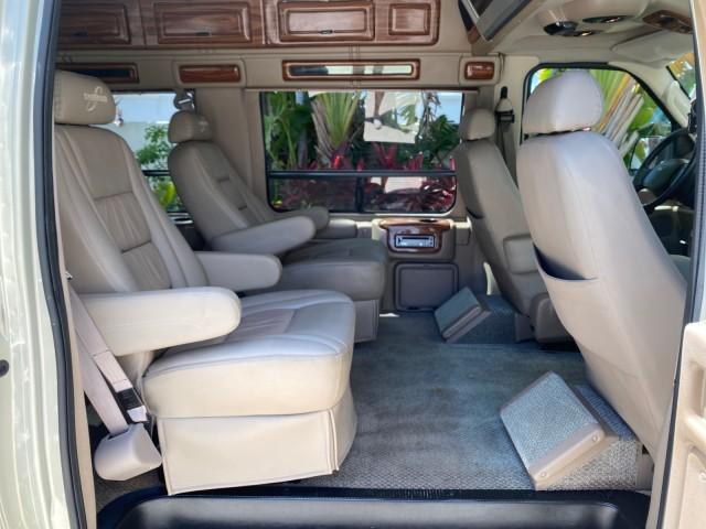2004 Gold Ash Metallic /Medium Pebble Ford Econoline HIGH TOP CONVERSION VAN 1 OWNER LOW MILES 37,883 (1FDRE14L64H) with an 5.4L SOHC EFI V8 Triton Engine engine, Automatic transmission, located at 4701 North Dixie Hwy, Pompano Beach, FL, 33064, (954) 422-2889, 26.240938, -80.123474 - OUR WEBPAGE FLORIDACARS1.COM HAS OVER 100 PHOTOS AND FREE CARFAX LINK 2004 Ford Econoline E150 HIGH TOP CONVERSION VAN SHERROD 1 OWNER Van 5.4L V8 F SOHC 16V Gasoline 17 MPG Rear Wheel Drive Features ABS Brakes Air Conditioning Alloy Wheels AM/FM Stereo Automatic Transmission CD Audio Conversion Van - Photo#14