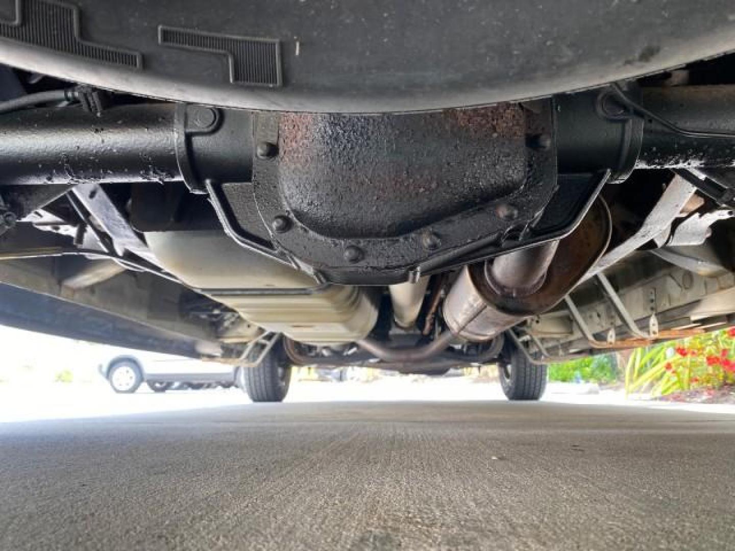 2004 Gold Ash Metallic /Medium Pebble Ford Econoline HIGH TOP CONVERSION VAN 1 OWNER LOW MILES 37,883 (1FDRE14L64H) with an 5.4L SOHC EFI V8 Triton Engine engine, Automatic transmission, located at 4701 North Dixie Hwy, Pompano Beach, FL, 33064, (954) 422-2889, 26.240938, -80.123474 - OUR WEBPAGE FLORIDACARS1.COM HAS OVER 100 PHOTOS AND FREE CARFAX LINK 2004 Ford Econoline E150 HIGH TOP CONVERSION VAN SHERROD 1 OWNER Van 5.4L V8 F SOHC 16V Gasoline 17 MPG Rear Wheel Drive Features ABS Brakes Air Conditioning Alloy Wheels AM/FM Stereo Automatic Transmission CD Audio Conversion Van- Photo#22