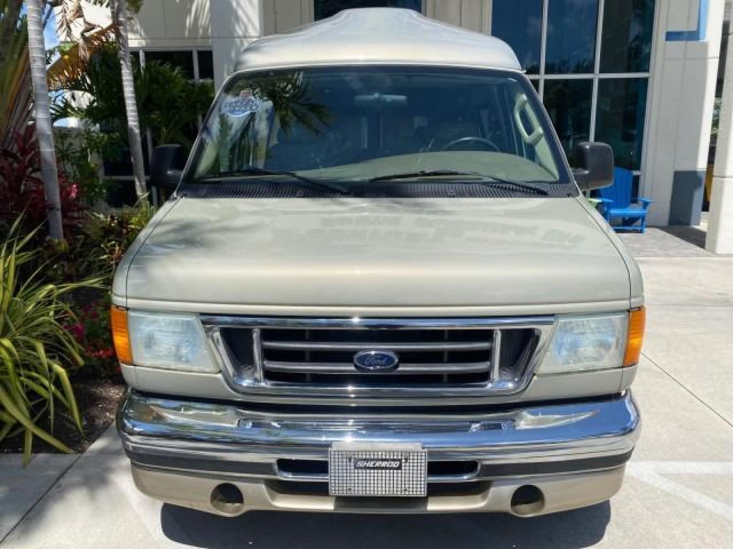 2004 Gold Ash Metallic /Medium Pebble Ford Econoline HIGH TOP CONVERSION VAN 1 OWNER LOW MILES 37,883 (1FDRE14L64H) with an 5.4L SOHC EFI V8 Triton Engine engine, Automatic transmission, located at 4701 North Dixie Hwy, Pompano Beach, FL, 33064, (954) 422-2889, 26.240938, -80.123474 - OUR WEBPAGE FLORIDACARS1.COM HAS OVER 100 PHOTOS AND FREE CARFAX LINK 2004 Ford Econoline E150 HIGH TOP CONVERSION VAN SHERROD 1 OWNER Van 5.4L V8 F SOHC 16V Gasoline 17 MPG Rear Wheel Drive Features ABS Brakes Air Conditioning Alloy Wheels AM/FM Stereo Automatic Transmission CD Audio Conversion Van- Photo#27