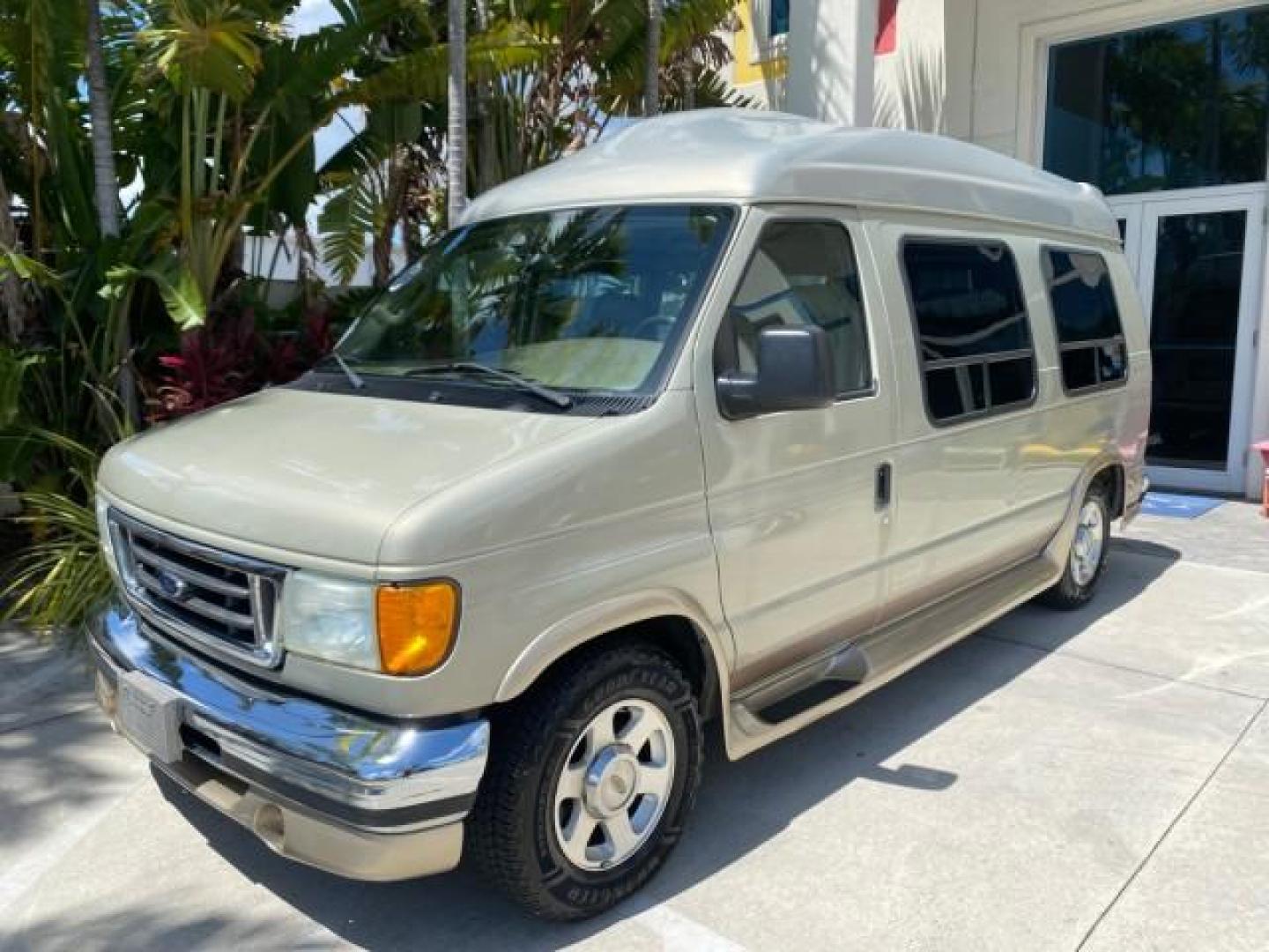 2004 Gold Ash Metallic /Medium Pebble Ford Econoline HIGH TOP CONVERSION VAN 1 OWNER LOW MILES 37,883 (1FDRE14L64H) with an 5.4L SOHC EFI V8 Triton Engine engine, Automatic transmission, located at 4701 North Dixie Hwy, Pompano Beach, FL, 33064, (954) 422-2889, 26.240938, -80.123474 - OUR WEBPAGE FLORIDACARS1.COM HAS OVER 100 PHOTOS AND FREE CARFAX LINK 2004 Ford Econoline E150 HIGH TOP CONVERSION VAN SHERROD 1 OWNER Van 5.4L V8 F SOHC 16V Gasoline 17 MPG Rear Wheel Drive Features ABS Brakes Air Conditioning Alloy Wheels AM/FM Stereo Automatic Transmission CD Audio Conversion Van- Photo#29