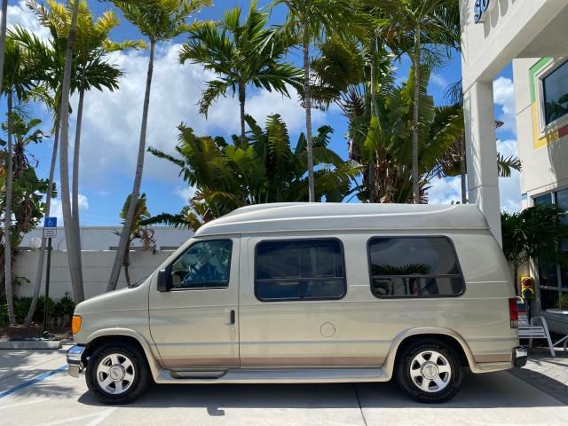 2004 Gold Ash Metallic /Medium Pebble Ford Econoline HIGH TOP CONVERSION VAN 1 OWNER LOW MILES 37,883 (1FDRE14L64H) with an 5.4L SOHC EFI V8 Triton Engine engine, Automatic transmission, located at 4701 North Dixie Hwy, Pompano Beach, FL, 33064, (954) 422-2889, 26.240938, -80.123474 - OUR WEBPAGE FLORIDACARS1.COM HAS OVER 100 PHOTOS AND FREE CARFAX LINK 2004 Ford Econoline E150 HIGH TOP CONVERSION VAN SHERROD 1 OWNER Van 5.4L V8 F SOHC 16V Gasoline 17 MPG Rear Wheel Drive Features ABS Brakes Air Conditioning Alloy Wheels AM/FM Stereo Automatic Transmission CD Audio Conversion Van - Photo#30