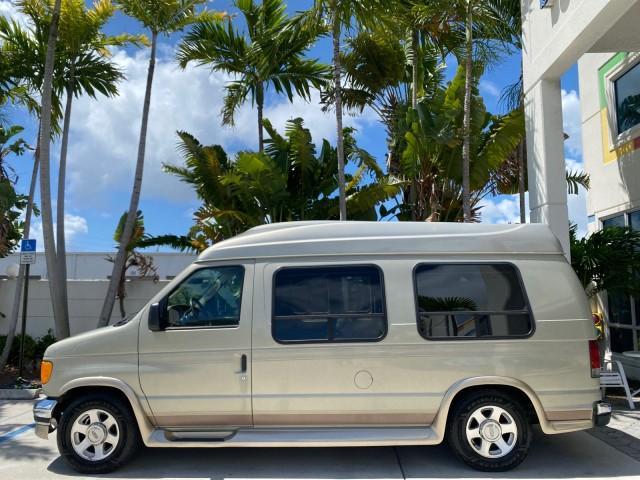 2004 Gold Ash Metallic /Medium Pebble Ford Econoline HIGH TOP CONVERSION VAN 1 OWNER LOW MILES 37,883 (1FDRE14L64H) with an 5.4L SOHC EFI V8 Triton Engine engine, Automatic transmission, located at 4701 North Dixie Hwy, Pompano Beach, FL, 33064, (954) 422-2889, 26.240938, -80.123474 - OUR WEBPAGE FLORIDACARS1.COM HAS OVER 100 PHOTOS AND FREE CARFAX LINK 2004 Ford Econoline E150 HIGH TOP CONVERSION VAN SHERROD 1 OWNER Van 5.4L V8 F SOHC 16V Gasoline 17 MPG Rear Wheel Drive Features ABS Brakes Air Conditioning Alloy Wheels AM/FM Stereo Automatic Transmission CD Audio Conversion Van - Photo#31