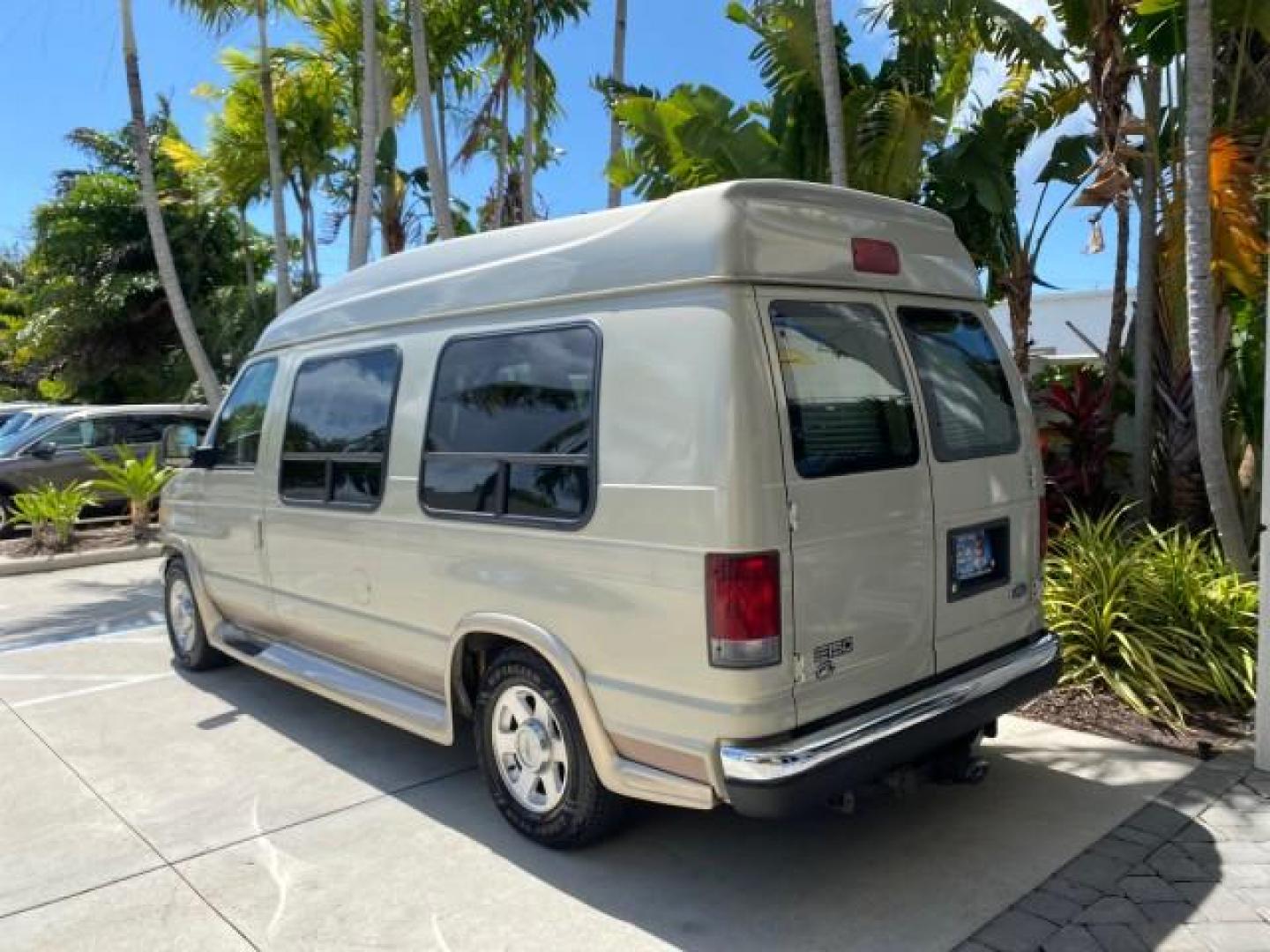 2004 Gold Ash Metallic /Medium Pebble Ford Econoline HIGH TOP CONVERSION VAN 1 OWNER LOW MILES 37,883 (1FDRE14L64H) with an 5.4L SOHC EFI V8 Triton Engine engine, Automatic transmission, located at 4701 North Dixie Hwy, Pompano Beach, FL, 33064, (954) 422-2889, 26.240938, -80.123474 - OUR WEBPAGE FLORIDACARS1.COM HAS OVER 100 PHOTOS AND FREE CARFAX LINK 2004 Ford Econoline E150 HIGH TOP CONVERSION VAN SHERROD 1 OWNER Van 5.4L V8 F SOHC 16V Gasoline 17 MPG Rear Wheel Drive Features ABS Brakes Air Conditioning Alloy Wheels AM/FM Stereo Automatic Transmission CD Audio Conversion Van- Photo#32