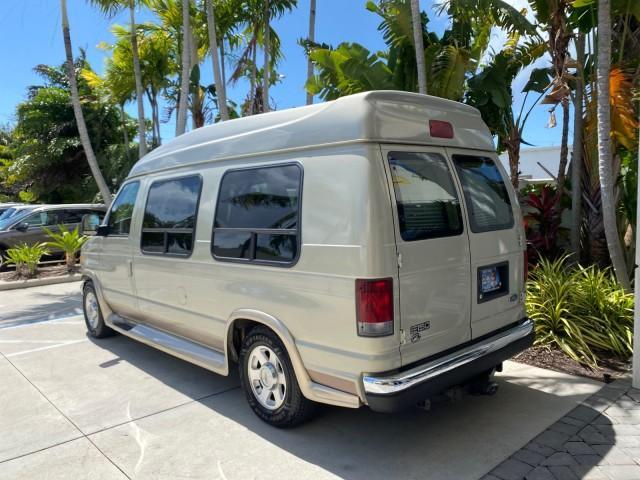 2004 Gold Ash Metallic /Medium Pebble Ford Econoline HIGH TOP CONVERSION VAN 1 OWNER LOW MILES 37,883 (1FDRE14L64H) with an 5.4L SOHC EFI V8 Triton Engine engine, Automatic transmission, located at 4701 North Dixie Hwy, Pompano Beach, FL, 33064, (954) 422-2889, 26.240938, -80.123474 - OUR WEBPAGE FLORIDACARS1.COM HAS OVER 100 PHOTOS AND FREE CARFAX LINK 2004 Ford Econoline E150 HIGH TOP CONVERSION VAN SHERROD 1 OWNER Van 5.4L V8 F SOHC 16V Gasoline 17 MPG Rear Wheel Drive Features ABS Brakes Air Conditioning Alloy Wheels AM/FM Stereo Automatic Transmission CD Audio Conversion Van - Photo#32