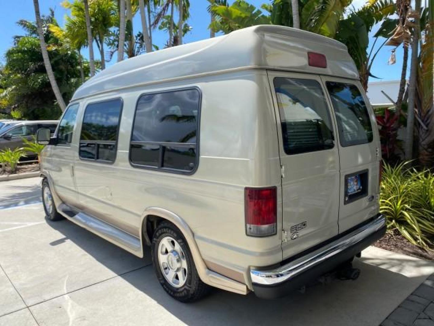 2004 Gold Ash Metallic /Medium Pebble Ford Econoline HIGH TOP CONVERSION VAN 1 OWNER LOW MILES 37,883 (1FDRE14L64H) with an 5.4L SOHC EFI V8 Triton Engine engine, Automatic transmission, located at 4701 North Dixie Hwy, Pompano Beach, FL, 33064, (954) 422-2889, 26.240938, -80.123474 - OUR WEBPAGE FLORIDACARS1.COM HAS OVER 100 PHOTOS AND FREE CARFAX LINK 2004 Ford Econoline E150 HIGH TOP CONVERSION VAN SHERROD 1 OWNER Van 5.4L V8 F SOHC 16V Gasoline 17 MPG Rear Wheel Drive Features ABS Brakes Air Conditioning Alloy Wheels AM/FM Stereo Automatic Transmission CD Audio Conversion Van- Photo#33