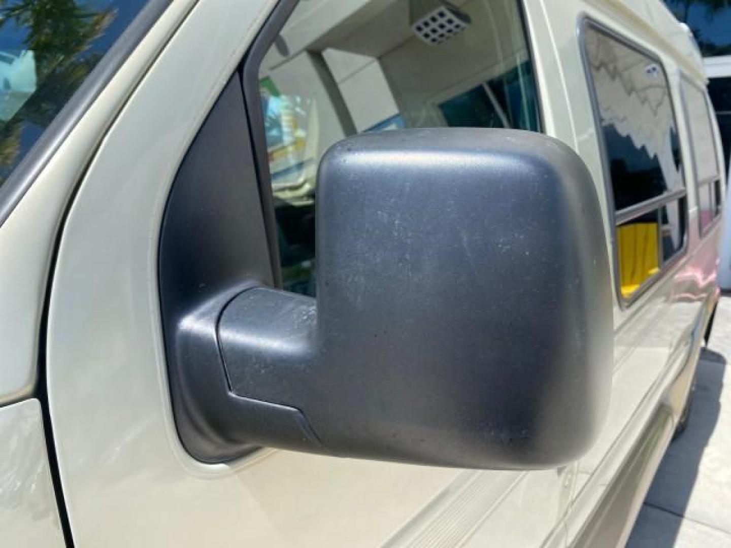 2004 Gold Ash Metallic /Medium Pebble Ford Econoline HIGH TOP CONVERSION VAN 1 OWNER LOW MILES 37,883 (1FDRE14L64H) with an 5.4L SOHC EFI V8 Triton Engine engine, Automatic transmission, located at 4701 North Dixie Hwy, Pompano Beach, FL, 33064, (954) 422-2889, 26.240938, -80.123474 - OUR WEBPAGE FLORIDACARS1.COM HAS OVER 100 PHOTOS AND FREE CARFAX LINK 2004 Ford Econoline E150 HIGH TOP CONVERSION VAN SHERROD 1 OWNER Van 5.4L V8 F SOHC 16V Gasoline 17 MPG Rear Wheel Drive Features ABS Brakes Air Conditioning Alloy Wheels AM/FM Stereo Automatic Transmission CD Audio Conversion Van- Photo#40