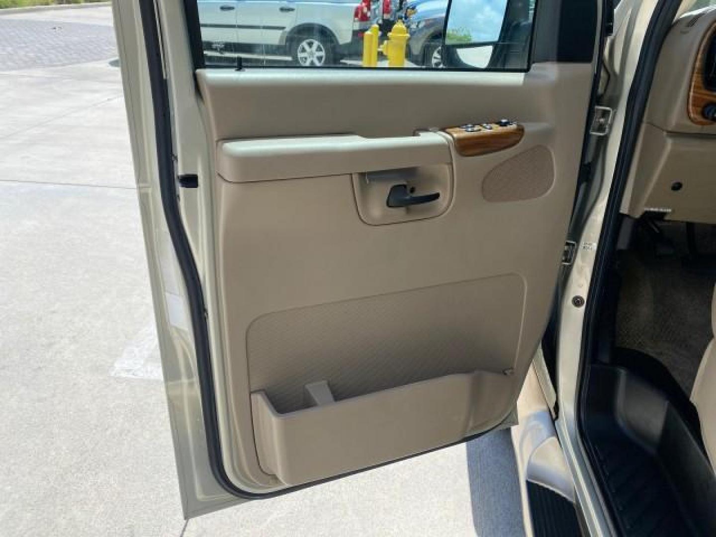 2004 Gold Ash Metallic /Medium Pebble Ford Econoline HIGH TOP CONVERSION VAN 1 OWNER LOW MILES 37,883 (1FDRE14L64H) with an 5.4L SOHC EFI V8 Triton Engine engine, Automatic transmission, located at 4701 North Dixie Hwy, Pompano Beach, FL, 33064, (954) 422-2889, 26.240938, -80.123474 - OUR WEBPAGE FLORIDACARS1.COM HAS OVER 100 PHOTOS AND FREE CARFAX LINK 2004 Ford Econoline E150 HIGH TOP CONVERSION VAN SHERROD 1 OWNER Van 5.4L V8 F SOHC 16V Gasoline 17 MPG Rear Wheel Drive Features ABS Brakes Air Conditioning Alloy Wheels AM/FM Stereo Automatic Transmission CD Audio Conversion Van- Photo#42