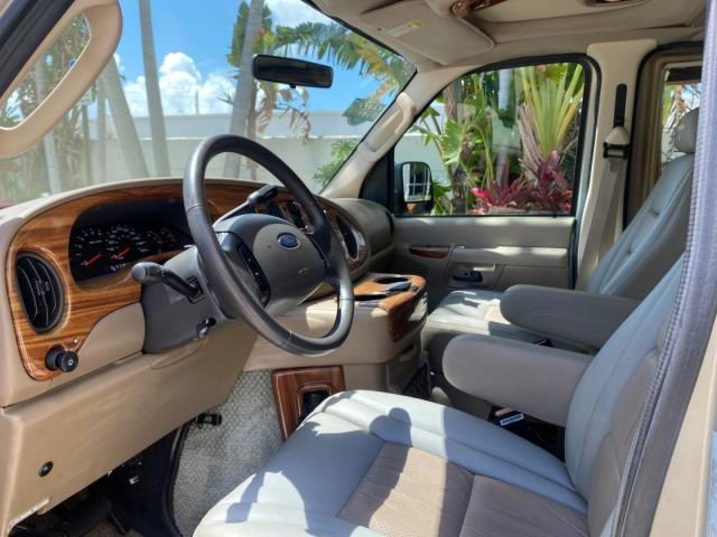 2004 Gold Ash Metallic /Medium Pebble Ford Econoline HIGH TOP CONVERSION VAN 1 OWNER LOW MILES 37,883 (1FDRE14L64H) with an 5.4L SOHC EFI V8 Triton Engine engine, Automatic transmission, located at 4701 North Dixie Hwy, Pompano Beach, FL, 33064, (954) 422-2889, 26.240938, -80.123474 - OUR WEBPAGE FLORIDACARS1.COM HAS OVER 100 PHOTOS AND FREE CARFAX LINK 2004 Ford Econoline E150 HIGH TOP CONVERSION VAN SHERROD 1 OWNER Van 5.4L V8 F SOHC 16V Gasoline 17 MPG Rear Wheel Drive Features ABS Brakes Air Conditioning Alloy Wheels AM/FM Stereo Automatic Transmission CD Audio Conversion Van- Photo#47