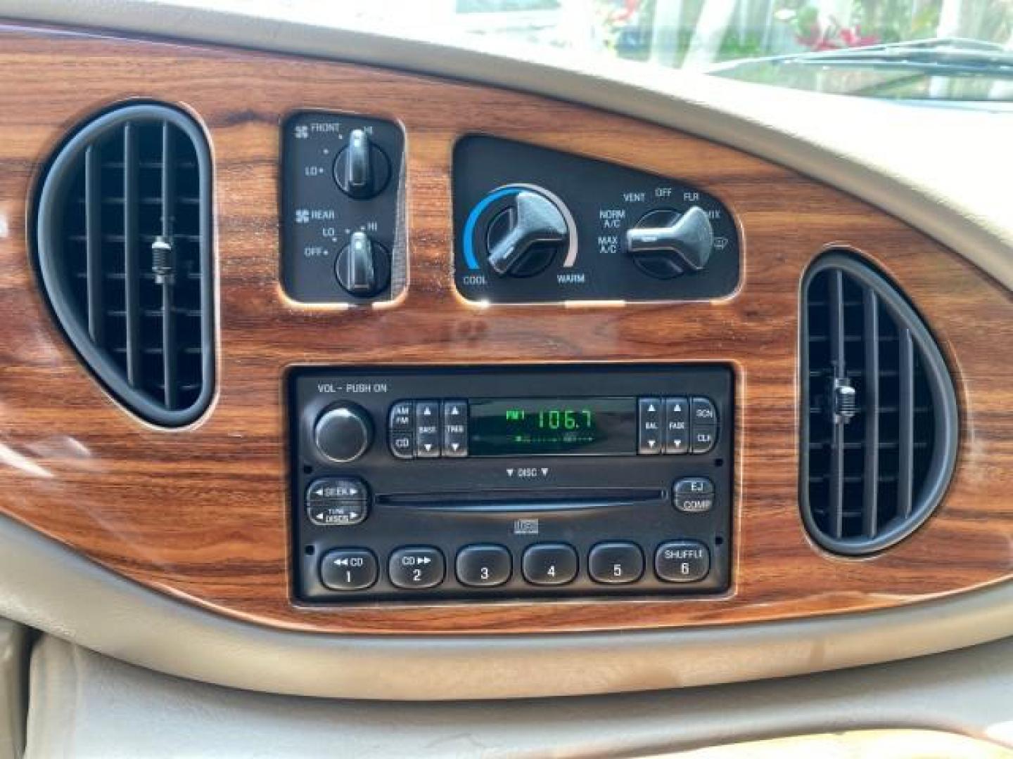 2004 Gold Ash Metallic /Medium Pebble Ford Econoline HIGH TOP CONVERSION VAN 1 OWNER LOW MILES 37,883 (1FDRE14L64H) with an 5.4L SOHC EFI V8 Triton Engine engine, Automatic transmission, located at 4701 North Dixie Hwy, Pompano Beach, FL, 33064, (954) 422-2889, 26.240938, -80.123474 - OUR WEBPAGE FLORIDACARS1.COM HAS OVER 100 PHOTOS AND FREE CARFAX LINK 2004 Ford Econoline E150 HIGH TOP CONVERSION VAN SHERROD 1 OWNER Van 5.4L V8 F SOHC 16V Gasoline 17 MPG Rear Wheel Drive Features ABS Brakes Air Conditioning Alloy Wheels AM/FM Stereo Automatic Transmission CD Audio Conversion Van- Photo#59