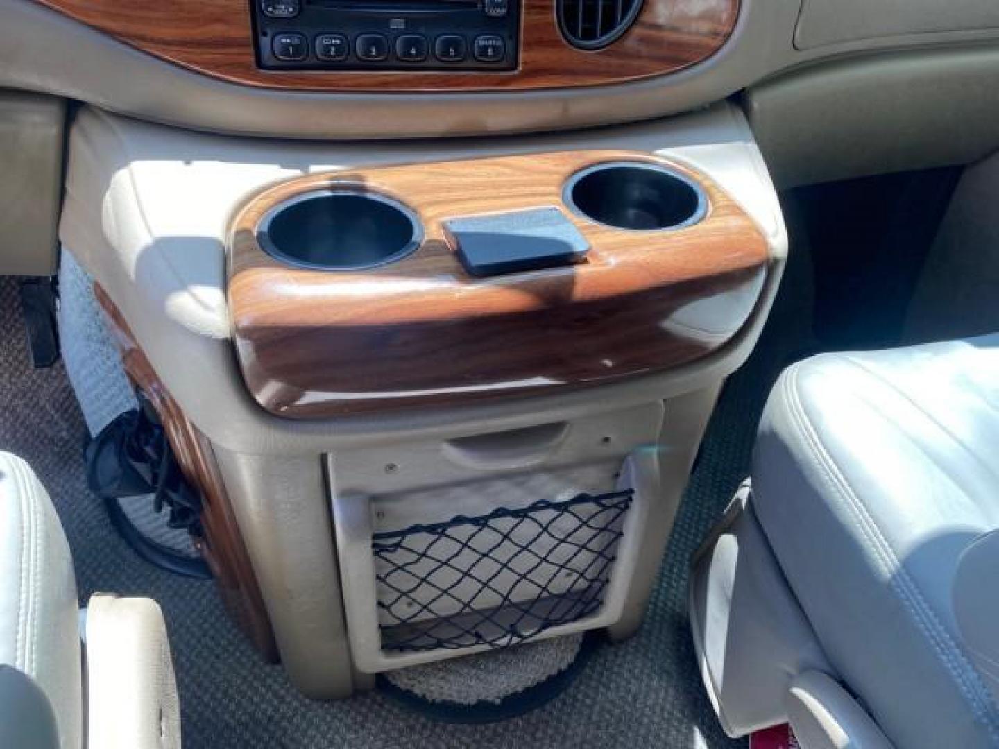 2004 Gold Ash Metallic /Medium Pebble Ford Econoline HIGH TOP CONVERSION VAN 1 OWNER LOW MILES 37,883 (1FDRE14L64H) with an 5.4L SOHC EFI V8 Triton Engine engine, Automatic transmission, located at 4701 North Dixie Hwy, Pompano Beach, FL, 33064, (954) 422-2889, 26.240938, -80.123474 - OUR WEBPAGE FLORIDACARS1.COM HAS OVER 100 PHOTOS AND FREE CARFAX LINK 2004 Ford Econoline E150 HIGH TOP CONVERSION VAN SHERROD 1 OWNER Van 5.4L V8 F SOHC 16V Gasoline 17 MPG Rear Wheel Drive Features ABS Brakes Air Conditioning Alloy Wheels AM/FM Stereo Automatic Transmission CD Audio Conversion Van- Photo#63