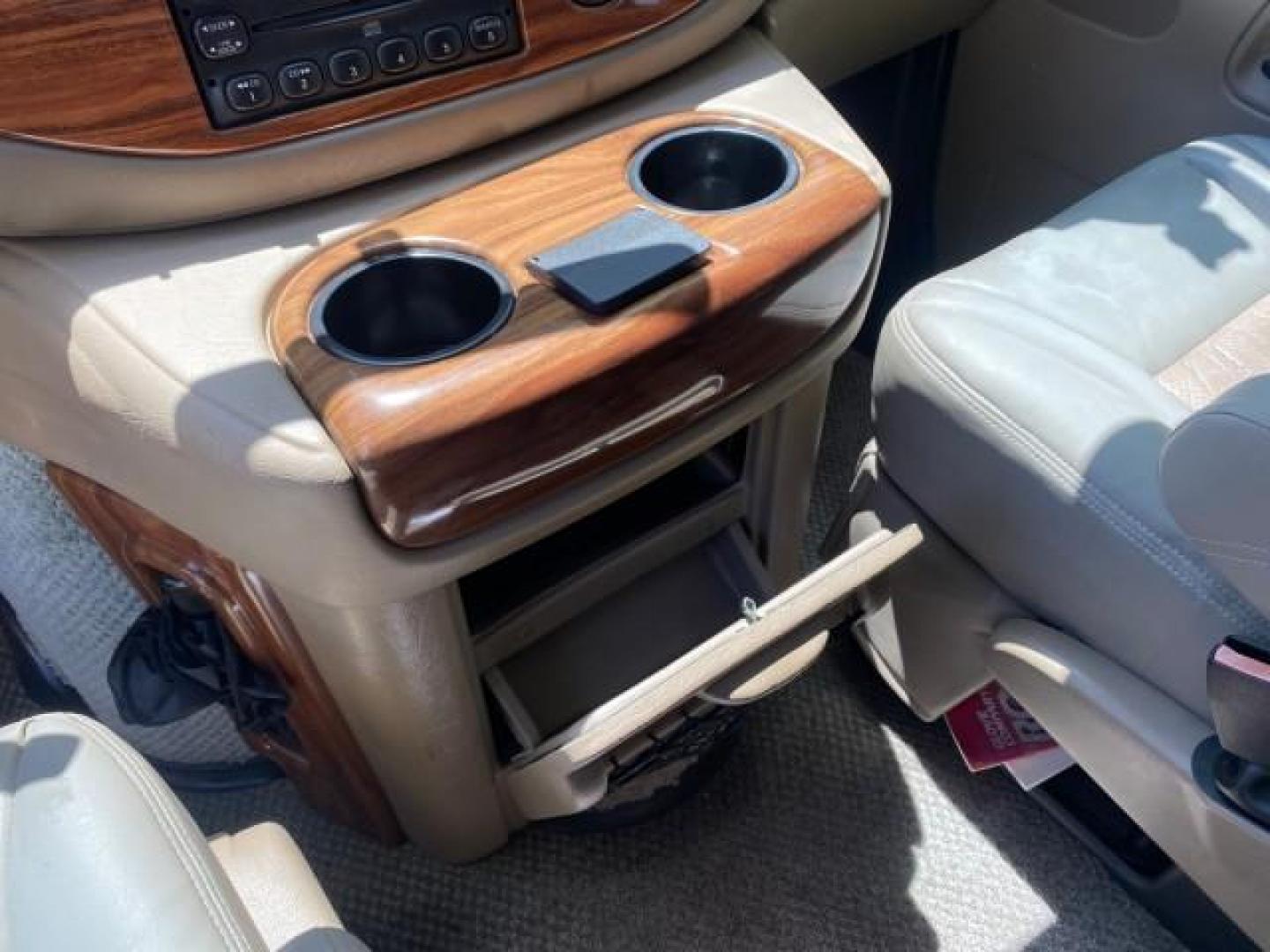2004 Gold Ash Metallic /Medium Pebble Ford Econoline HIGH TOP CONVERSION VAN 1 OWNER LOW MILES 37,883 (1FDRE14L64H) with an 5.4L SOHC EFI V8 Triton Engine engine, Automatic transmission, located at 4701 North Dixie Hwy, Pompano Beach, FL, 33064, (954) 422-2889, 26.240938, -80.123474 - OUR WEBPAGE FLORIDACARS1.COM HAS OVER 100 PHOTOS AND FREE CARFAX LINK 2004 Ford Econoline E150 HIGH TOP CONVERSION VAN SHERROD 1 OWNER Van 5.4L V8 F SOHC 16V Gasoline 17 MPG Rear Wheel Drive Features ABS Brakes Air Conditioning Alloy Wheels AM/FM Stereo Automatic Transmission CD Audio Conversion Van- Photo#64