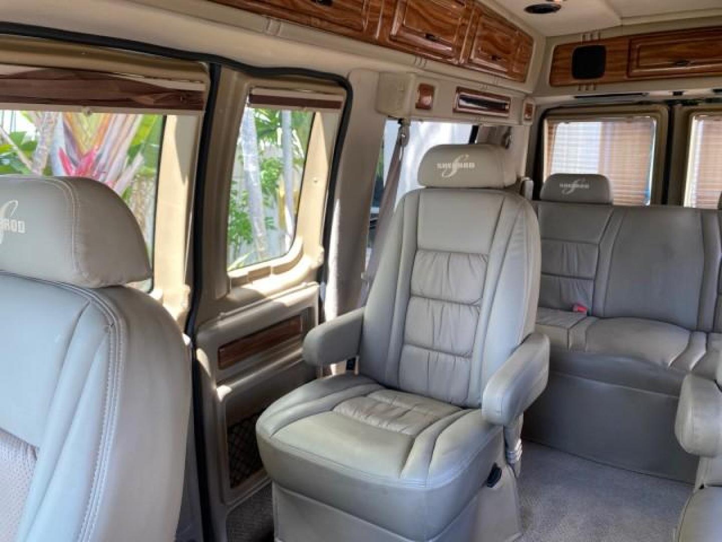2004 Gold Ash Metallic /Medium Pebble Ford Econoline HIGH TOP CONVERSION VAN 1 OWNER LOW MILES 37,883 (1FDRE14L64H) with an 5.4L SOHC EFI V8 Triton Engine engine, Automatic transmission, located at 4701 North Dixie Hwy, Pompano Beach, FL, 33064, (954) 422-2889, 26.240938, -80.123474 - OUR WEBPAGE FLORIDACARS1.COM HAS OVER 100 PHOTOS AND FREE CARFAX LINK 2004 Ford Econoline E150 HIGH TOP CONVERSION VAN SHERROD 1 OWNER Van 5.4L V8 F SOHC 16V Gasoline 17 MPG Rear Wheel Drive Features ABS Brakes Air Conditioning Alloy Wheels AM/FM Stereo Automatic Transmission CD Audio Conversion Van- Photo#72