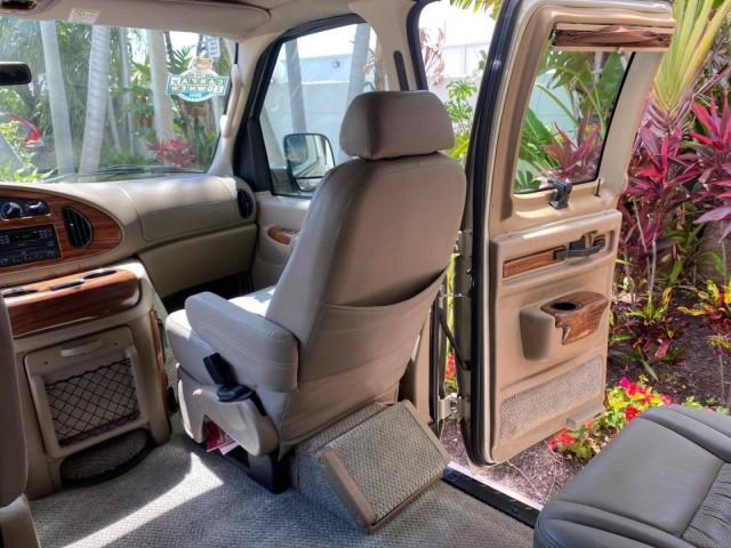 2004 Gold Ash Metallic /Medium Pebble Ford Econoline HIGH TOP CONVERSION VAN 1 OWNER LOW MILES 37,883 (1FDRE14L64H) with an 5.4L SOHC EFI V8 Triton Engine engine, Automatic transmission, located at 4701 North Dixie Hwy, Pompano Beach, FL, 33064, (954) 422-2889, 26.240938, -80.123474 - OUR WEBPAGE FLORIDACARS1.COM HAS OVER 100 PHOTOS AND FREE CARFAX LINK 2004 Ford Econoline E150 HIGH TOP CONVERSION VAN SHERROD 1 OWNER Van 5.4L V8 F SOHC 16V Gasoline 17 MPG Rear Wheel Drive Features ABS Brakes Air Conditioning Alloy Wheels AM/FM Stereo Automatic Transmission CD Audio Conversion Van- Photo#77