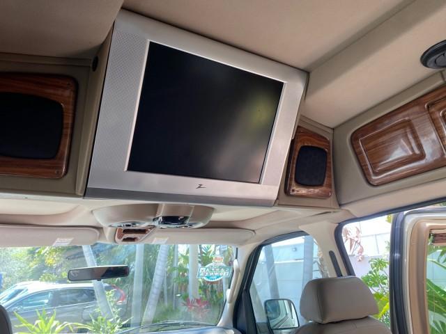 2004 Gold Ash Metallic /Medium Pebble Ford Econoline HIGH TOP CONVERSION VAN 1 OWNER LOW MILES 37,883 (1FDRE14L64H) with an 5.4L SOHC EFI V8 Triton Engine engine, Automatic transmission, located at 4701 North Dixie Hwy, Pompano Beach, FL, 33064, (954) 422-2889, 26.240938, -80.123474 - OUR WEBPAGE FLORIDACARS1.COM HAS OVER 100 PHOTOS AND FREE CARFAX LINK 2004 Ford Econoline E150 HIGH TOP CONVERSION VAN SHERROD 1 OWNER Van 5.4L V8 F SOHC 16V Gasoline 17 MPG Rear Wheel Drive Features ABS Brakes Air Conditioning Alloy Wheels AM/FM Stereo Automatic Transmission CD Audio Conversion Van - Photo#78