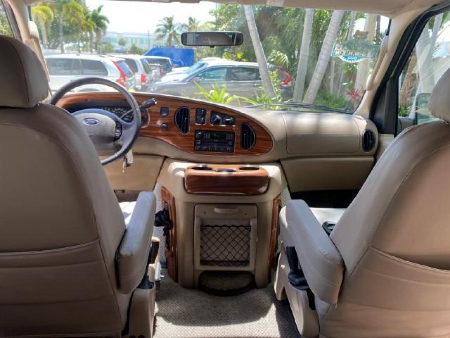 2004 Gold Ash Metallic /Medium Pebble Ford Econoline HIGH TOP CONVERSION VAN 1 OWNER LOW MILES 37,883 (1FDRE14L64H) with an 5.4L SOHC EFI V8 Triton Engine engine, Automatic transmission, located at 4701 North Dixie Hwy, Pompano Beach, FL, 33064, (954) 422-2889, 26.240938, -80.123474 - OUR WEBPAGE FLORIDACARS1.COM HAS OVER 100 PHOTOS AND FREE CARFAX LINK 2004 Ford Econoline E150 HIGH TOP CONVERSION VAN SHERROD 1 OWNER Van 5.4L V8 F SOHC 16V Gasoline 17 MPG Rear Wheel Drive Features ABS Brakes Air Conditioning Alloy Wheels AM/FM Stereo Automatic Transmission CD Audio Conversion Van- Photo#79