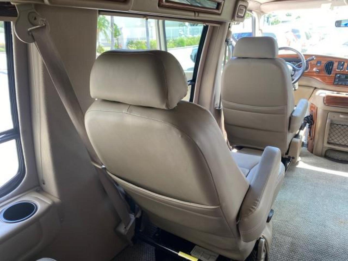 2004 Gold Ash Metallic /Medium Pebble Ford Econoline HIGH TOP CONVERSION VAN 1 OWNER LOW MILES 37,883 (1FDRE14L64H) with an 5.4L SOHC EFI V8 Triton Engine engine, Automatic transmission, located at 4701 North Dixie Hwy, Pompano Beach, FL, 33064, (954) 422-2889, 26.240938, -80.123474 - OUR WEBPAGE FLORIDACARS1.COM HAS OVER 100 PHOTOS AND FREE CARFAX LINK 2004 Ford Econoline E150 HIGH TOP CONVERSION VAN SHERROD 1 OWNER Van 5.4L V8 F SOHC 16V Gasoline 17 MPG Rear Wheel Drive Features ABS Brakes Air Conditioning Alloy Wheels AM/FM Stereo Automatic Transmission CD Audio Conversion Van- Photo#84