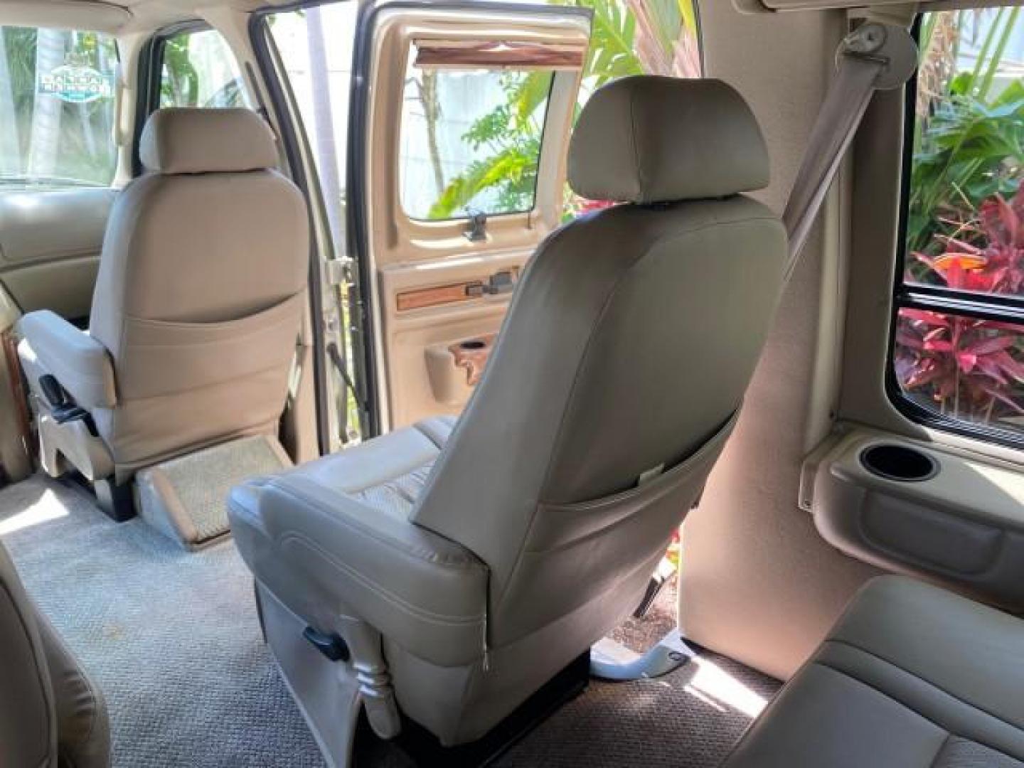 2004 Gold Ash Metallic /Medium Pebble Ford Econoline HIGH TOP CONVERSION VAN 1 OWNER LOW MILES 37,883 (1FDRE14L64H) with an 5.4L SOHC EFI V8 Triton Engine engine, Automatic transmission, located at 4701 North Dixie Hwy, Pompano Beach, FL, 33064, (954) 422-2889, 26.240938, -80.123474 - OUR WEBPAGE FLORIDACARS1.COM HAS OVER 100 PHOTOS AND FREE CARFAX LINK 2004 Ford Econoline E150 HIGH TOP CONVERSION VAN SHERROD 1 OWNER Van 5.4L V8 F SOHC 16V Gasoline 17 MPG Rear Wheel Drive Features ABS Brakes Air Conditioning Alloy Wheels AM/FM Stereo Automatic Transmission CD Audio Conversion Van- Photo#85