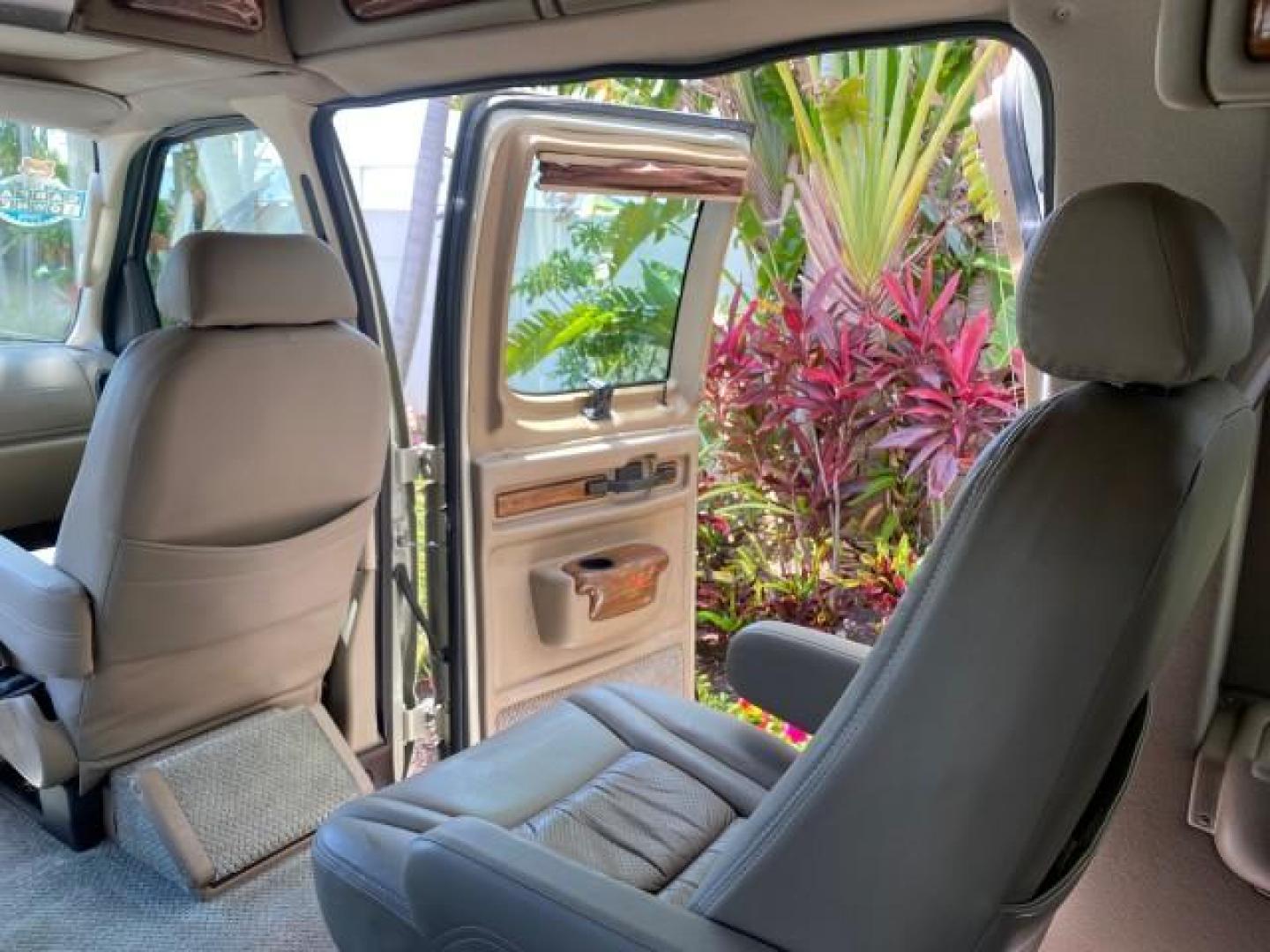 2004 Gold Ash Metallic /Medium Pebble Ford Econoline HIGH TOP CONVERSION VAN 1 OWNER LOW MILES 37,883 (1FDRE14L64H) with an 5.4L SOHC EFI V8 Triton Engine engine, Automatic transmission, located at 4701 North Dixie Hwy, Pompano Beach, FL, 33064, (954) 422-2889, 26.240938, -80.123474 - OUR WEBPAGE FLORIDACARS1.COM HAS OVER 100 PHOTOS AND FREE CARFAX LINK 2004 Ford Econoline E150 HIGH TOP CONVERSION VAN SHERROD 1 OWNER Van 5.4L V8 F SOHC 16V Gasoline 17 MPG Rear Wheel Drive Features ABS Brakes Air Conditioning Alloy Wheels AM/FM Stereo Automatic Transmission CD Audio Conversion Van- Photo#90