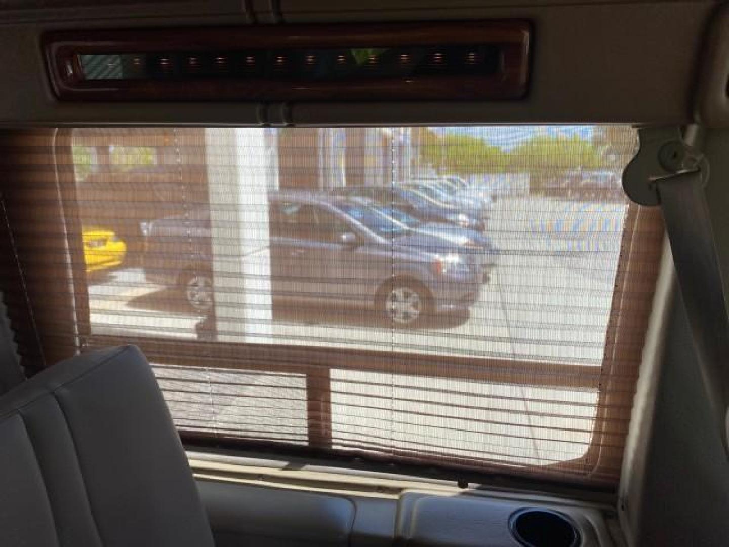 2004 Gold Ash Metallic /Medium Pebble Ford Econoline HIGH TOP CONVERSION VAN 1 OWNER LOW MILES 37,883 (1FDRE14L64H) with an 5.4L SOHC EFI V8 Triton Engine engine, Automatic transmission, located at 4701 North Dixie Hwy, Pompano Beach, FL, 33064, (954) 422-2889, 26.240938, -80.123474 - OUR WEBPAGE FLORIDACARS1.COM HAS OVER 100 PHOTOS AND FREE CARFAX LINK 2004 Ford Econoline E150 HIGH TOP CONVERSION VAN SHERROD 1 OWNER Van 5.4L V8 F SOHC 16V Gasoline 17 MPG Rear Wheel Drive Features ABS Brakes Air Conditioning Alloy Wheels AM/FM Stereo Automatic Transmission CD Audio Conversion Van- Photo#92