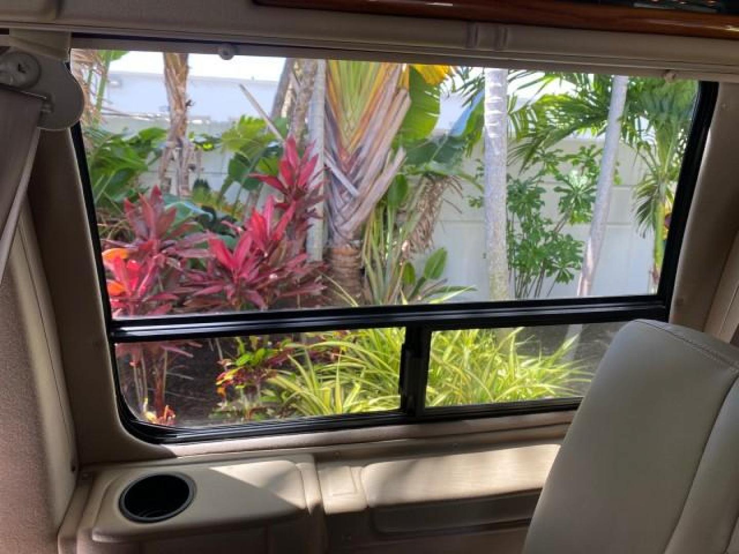 2004 Gold Ash Metallic /Medium Pebble Ford Econoline HIGH TOP CONVERSION VAN 1 OWNER LOW MILES 37,883 (1FDRE14L64H) with an 5.4L SOHC EFI V8 Triton Engine engine, Automatic transmission, located at 4701 North Dixie Hwy, Pompano Beach, FL, 33064, (954) 422-2889, 26.240938, -80.123474 - OUR WEBPAGE FLORIDACARS1.COM HAS OVER 100 PHOTOS AND FREE CARFAX LINK 2004 Ford Econoline E150 HIGH TOP CONVERSION VAN SHERROD 1 OWNER Van 5.4L V8 F SOHC 16V Gasoline 17 MPG Rear Wheel Drive Features ABS Brakes Air Conditioning Alloy Wheels AM/FM Stereo Automatic Transmission CD Audio Conversion Van- Photo#93