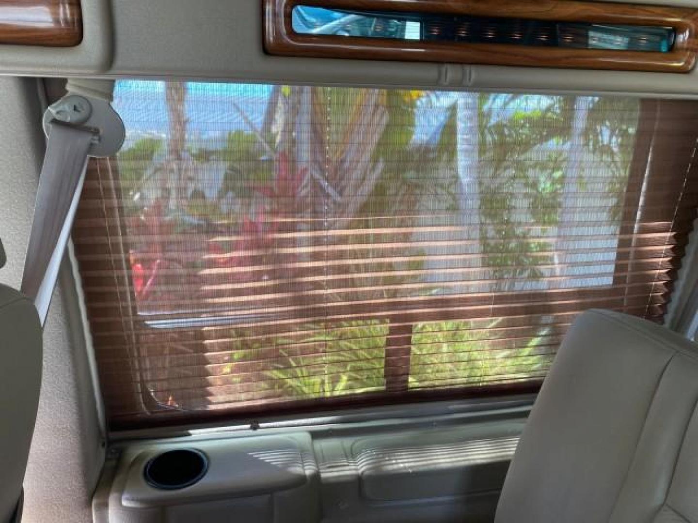 2004 Gold Ash Metallic /Medium Pebble Ford Econoline HIGH TOP CONVERSION VAN 1 OWNER LOW MILES 37,883 (1FDRE14L64H) with an 5.4L SOHC EFI V8 Triton Engine engine, Automatic transmission, located at 4701 North Dixie Hwy, Pompano Beach, FL, 33064, (954) 422-2889, 26.240938, -80.123474 - OUR WEBPAGE FLORIDACARS1.COM HAS OVER 100 PHOTOS AND FREE CARFAX LINK 2004 Ford Econoline E150 HIGH TOP CONVERSION VAN SHERROD 1 OWNER Van 5.4L V8 F SOHC 16V Gasoline 17 MPG Rear Wheel Drive Features ABS Brakes Air Conditioning Alloy Wheels AM/FM Stereo Automatic Transmission CD Audio Conversion Van- Photo#94