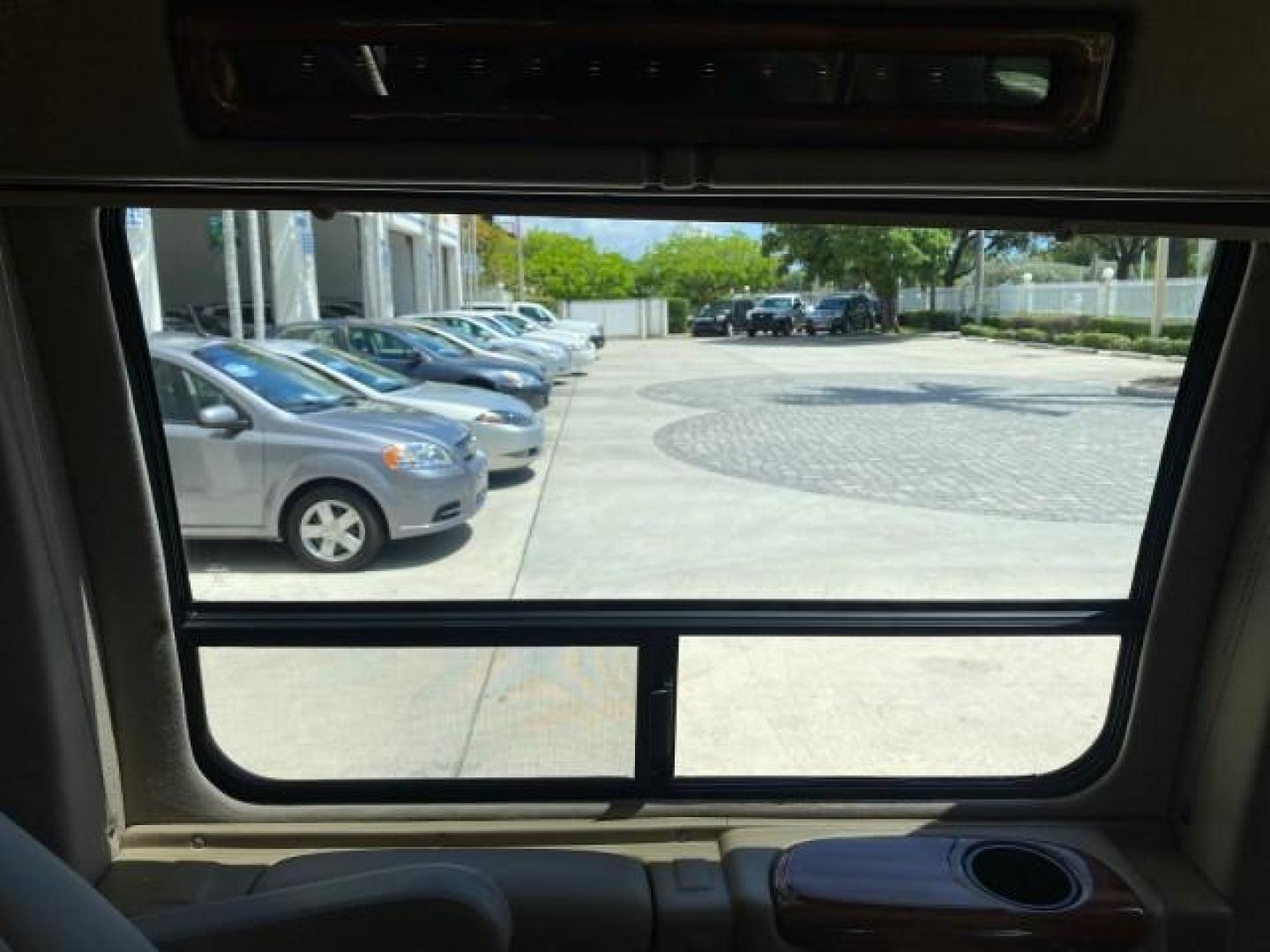 2004 Gold Ash Metallic /Medium Pebble Ford Econoline HIGH TOP CONVERSION VAN 1 OWNER LOW MILES 37,883 (1FDRE14L64H) with an 5.4L SOHC EFI V8 Triton Engine engine, Automatic transmission, located at 4701 North Dixie Hwy, Pompano Beach, FL, 33064, (954) 422-2889, 26.240938, -80.123474 - OUR WEBPAGE FLORIDACARS1.COM HAS OVER 100 PHOTOS AND FREE CARFAX LINK 2004 Ford Econoline E150 HIGH TOP CONVERSION VAN SHERROD 1 OWNER Van 5.4L V8 F SOHC 16V Gasoline 17 MPG Rear Wheel Drive Features ABS Brakes Air Conditioning Alloy Wheels AM/FM Stereo Automatic Transmission CD Audio Conversion Van- Photo#95
