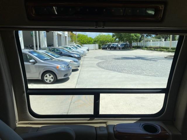 2004 Gold Ash Metallic /Medium Pebble Ford Econoline HIGH TOP CONVERSION VAN 1 OWNER LOW MILES 37,883 (1FDRE14L64H) with an 5.4L SOHC EFI V8 Triton Engine engine, Automatic transmission, located at 4701 North Dixie Hwy, Pompano Beach, FL, 33064, (954) 422-2889, 26.240938, -80.123474 - OUR WEBPAGE FLORIDACARS1.COM HAS OVER 100 PHOTOS AND FREE CARFAX LINK 2004 Ford Econoline E150 HIGH TOP CONVERSION VAN SHERROD 1 OWNER Van 5.4L V8 F SOHC 16V Gasoline 17 MPG Rear Wheel Drive Features ABS Brakes Air Conditioning Alloy Wheels AM/FM Stereo Automatic Transmission CD Audio Conversion Van - Photo#95