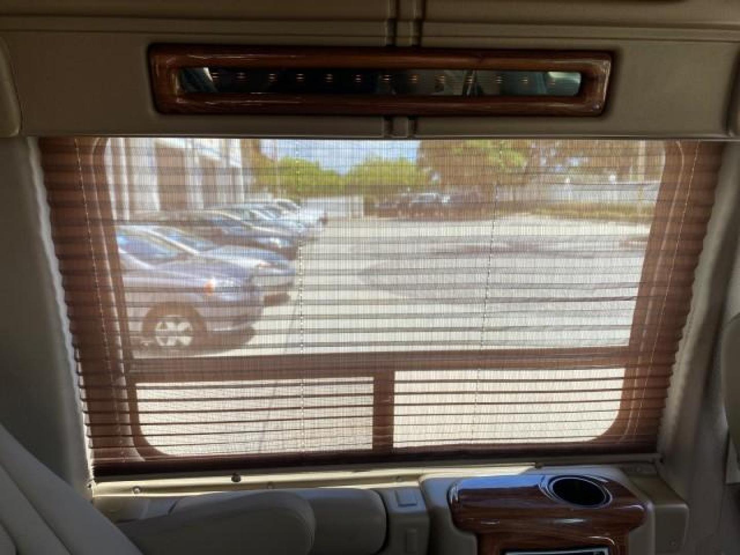 2004 Gold Ash Metallic /Medium Pebble Ford Econoline HIGH TOP CONVERSION VAN 1 OWNER LOW MILES 37,883 (1FDRE14L64H) with an 5.4L SOHC EFI V8 Triton Engine engine, Automatic transmission, located at 4701 North Dixie Hwy, Pompano Beach, FL, 33064, (954) 422-2889, 26.240938, -80.123474 - OUR WEBPAGE FLORIDACARS1.COM HAS OVER 100 PHOTOS AND FREE CARFAX LINK 2004 Ford Econoline E150 HIGH TOP CONVERSION VAN SHERROD 1 OWNER Van 5.4L V8 F SOHC 16V Gasoline 17 MPG Rear Wheel Drive Features ABS Brakes Air Conditioning Alloy Wheels AM/FM Stereo Automatic Transmission CD Audio Conversion Van- Photo#96