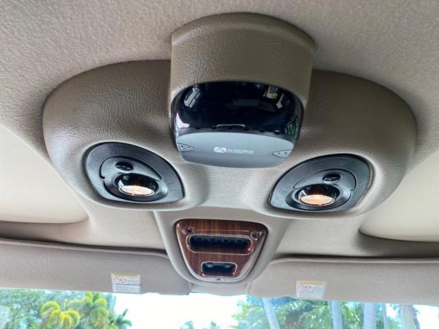2004 Gold Ash Metallic /Medium Pebble Ford Econoline HIGH TOP CONVERSION VAN 1 OWNER LOW MILES 37,883 (1FDRE14L64H) with an 5.4L SOHC EFI V8 Triton Engine engine, Automatic transmission, located at 4701 North Dixie Hwy, Pompano Beach, FL, 33064, (954) 422-2889, 26.240938, -80.123474 - OUR WEBPAGE FLORIDACARS1.COM HAS OVER 100 PHOTOS AND FREE CARFAX LINK 2004 Ford Econoline E150 HIGH TOP CONVERSION VAN SHERROD 1 OWNER Van 5.4L V8 F SOHC 16V Gasoline 17 MPG Rear Wheel Drive Features ABS Brakes Air Conditioning Alloy Wheels AM/FM Stereo Automatic Transmission CD Audio Conversion Van- Photo#97