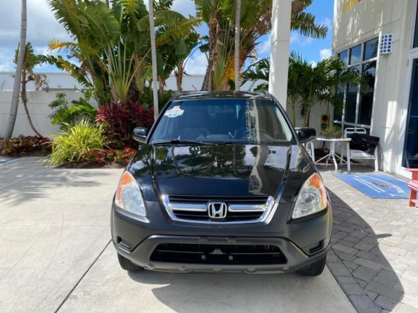 2004 Nighthawk Black Pearl /Black Honda CR-V 4WD EX LOW MILES 61,201 1 OWNER (SHSRD78874U) with an 2.4L DOHC PGM-FI 16-Valve i-VTEC I4 Engine engine, Automatic transmission, located at 4701 North Dixie Hwy, Pompano Beach, FL, 33064, (954) 422-2889, 26.240938, -80.123474 - OUR WEBPAGE FLORIDACARS1.COM HAS OVER 100 PHOTOS AND FREE CARFAX LINK 2004 Honda CR-V EX 1 OWNER 4 Door Wagon/Sport Utility 2.4L I4 F DOHC Gasoline 26 MPG All Wheel Drive Features Air Conditioning Alloy Wheels Cloth Seats Cruise Control Power Locks Power Mirrors Power Windows Sunroof(s) 2004 Honda C - Photo#2