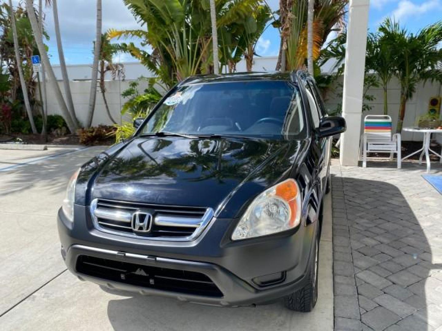2004 Nighthawk Black Pearl /Black Honda CR-V 4WD EX LOW MILES 61,201 1 OWNER (SHSRD78874U) with an 2.4L DOHC PGM-FI 16-Valve i-VTEC I4 Engine engine, Automatic transmission, located at 4701 North Dixie Hwy, Pompano Beach, FL, 33064, (954) 422-2889, 26.240938, -80.123474 - OUR WEBPAGE FLORIDACARS1.COM HAS OVER 100 PHOTOS AND FREE CARFAX LINK 2004 Honda CR-V EX 1 OWNER 4 Door Wagon/Sport Utility 2.4L I4 F DOHC Gasoline 26 MPG All Wheel Drive Features Air Conditioning Alloy Wheels Cloth Seats Cruise Control Power Locks Power Mirrors Power Windows Sunroof(s) 2004 Honda C - Photo#3