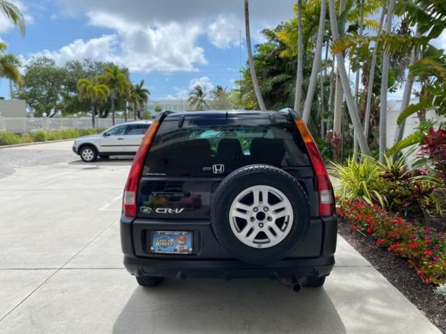 2004 Nighthawk Black Pearl /Black Honda CR-V 4WD EX LOW MILES 61,201 1 OWNER (SHSRD78874U) with an 2.4L DOHC PGM-FI 16-Valve i-VTEC I4 Engine engine, Automatic transmission, located at 4701 North Dixie Hwy, Pompano Beach, FL, 33064, (954) 422-2889, 26.240938, -80.123474 - OUR WEBPAGE FLORIDACARS1.COM HAS OVER 100 PHOTOS AND FREE CARFAX LINK 2004 Honda CR-V EX 1 OWNER 4 Door Wagon/Sport Utility 2.4L I4 F DOHC Gasoline 26 MPG All Wheel Drive Features Air Conditioning Alloy Wheels Cloth Seats Cruise Control Power Locks Power Mirrors Power Windows Sunroof(s) 2004 Honda C - Photo#6