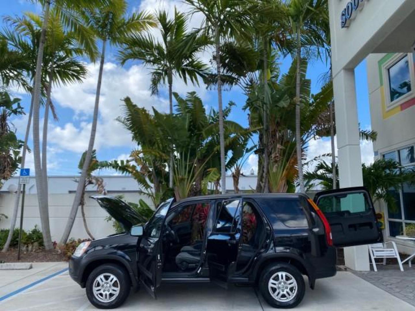 2004 Nighthawk Black Pearl /Black Honda CR-V 4WD EX LOW MILES 61,201 1 OWNER (SHSRD78874U) with an 2.4L DOHC PGM-FI 16-Valve i-VTEC I4 Engine engine, Automatic transmission, located at 4701 North Dixie Hwy, Pompano Beach, FL, 33064, (954) 422-2889, 26.240938, -80.123474 - OUR WEBPAGE FLORIDACARS1.COM HAS OVER 100 PHOTOS AND FREE CARFAX LINK 2004 Honda CR-V EX 1 OWNER 4 Door Wagon/Sport Utility 2.4L I4 F DOHC Gasoline 26 MPG All Wheel Drive Features Air Conditioning Alloy Wheels Cloth Seats Cruise Control Power Locks Power Mirrors Power Windows Sunroof(s) 2004 Honda C - Photo#8