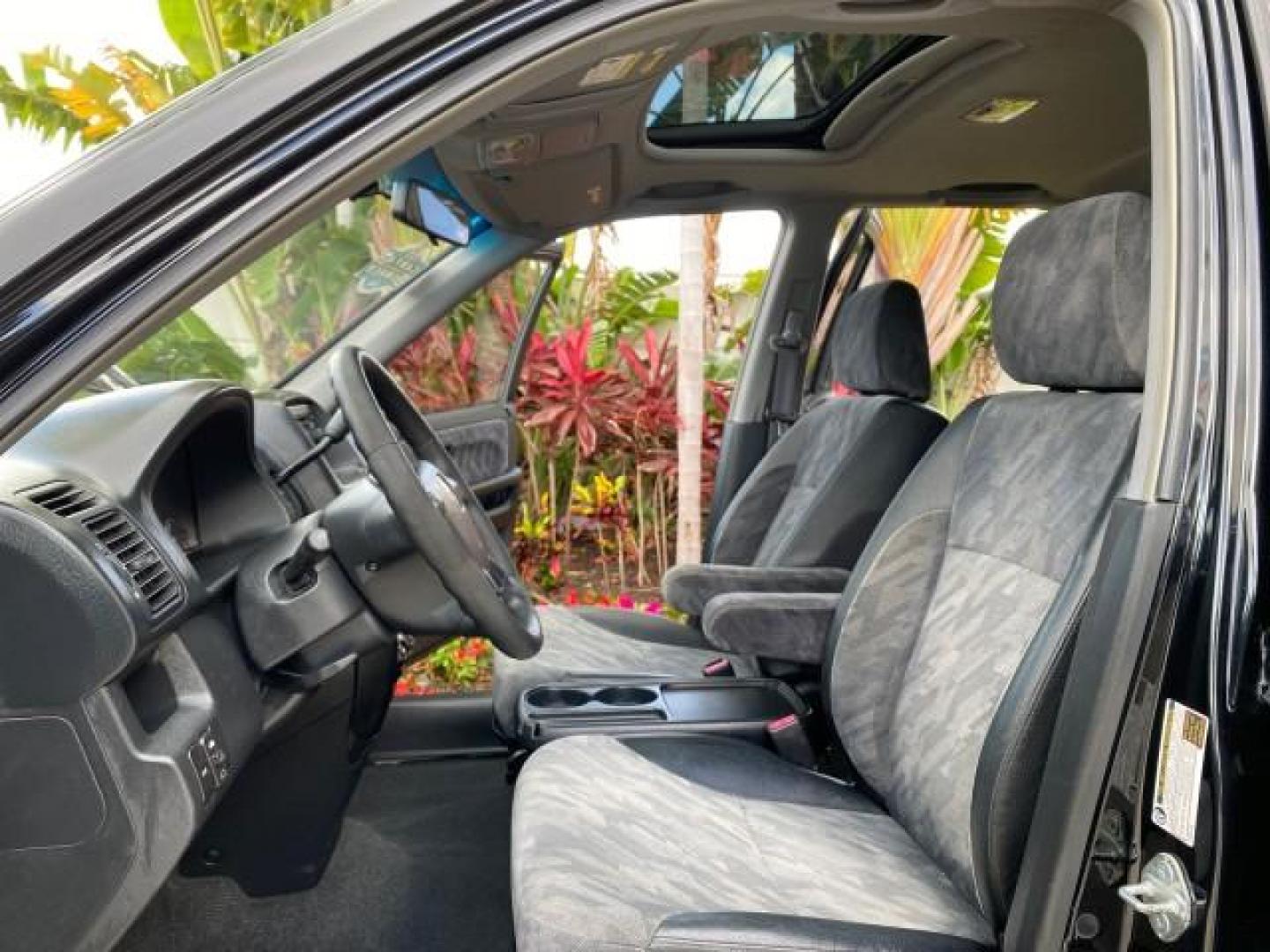 2004 Nighthawk Black Pearl /Black Honda CR-V 4WD EX LOW MILES 61,201 1 OWNER (SHSRD78874U) with an 2.4L DOHC PGM-FI 16-Valve i-VTEC I4 Engine engine, Automatic transmission, located at 4701 North Dixie Hwy, Pompano Beach, FL, 33064, (954) 422-2889, 26.240938, -80.123474 - OUR WEBPAGE FLORIDACARS1.COM HAS OVER 100 PHOTOS AND FREE CARFAX LINK 2004 Honda CR-V EX 1 OWNER 4 Door Wagon/Sport Utility 2.4L I4 F DOHC Gasoline 26 MPG All Wheel Drive Features Air Conditioning Alloy Wheels Cloth Seats Cruise Control Power Locks Power Mirrors Power Windows Sunroof(s) 2004 Honda C - Photo#10