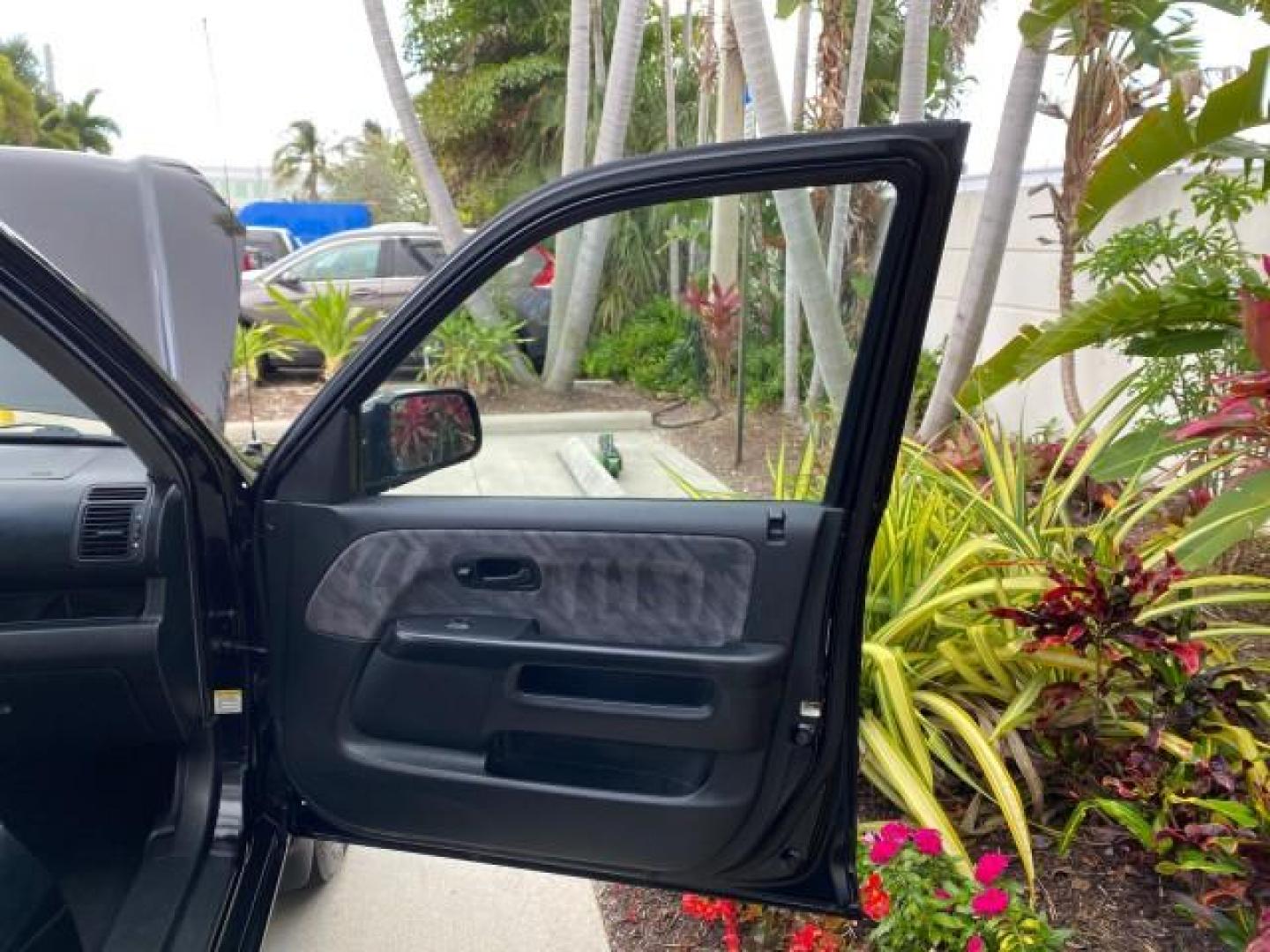 2004 Nighthawk Black Pearl /Black Honda CR-V 4WD EX LOW MILES 61,201 1 OWNER (SHSRD78874U) with an 2.4L DOHC PGM-FI 16-Valve i-VTEC I4 Engine engine, Automatic transmission, located at 4701 North Dixie Hwy, Pompano Beach, FL, 33064, (954) 422-2889, 26.240938, -80.123474 - OUR WEBPAGE FLORIDACARS1.COM HAS OVER 100 PHOTOS AND FREE CARFAX LINK 2004 Honda CR-V EX 1 OWNER 4 Door Wagon/Sport Utility 2.4L I4 F DOHC Gasoline 26 MPG All Wheel Drive Features Air Conditioning Alloy Wheels Cloth Seats Cruise Control Power Locks Power Mirrors Power Windows Sunroof(s) 2004 Honda C - Photo#11